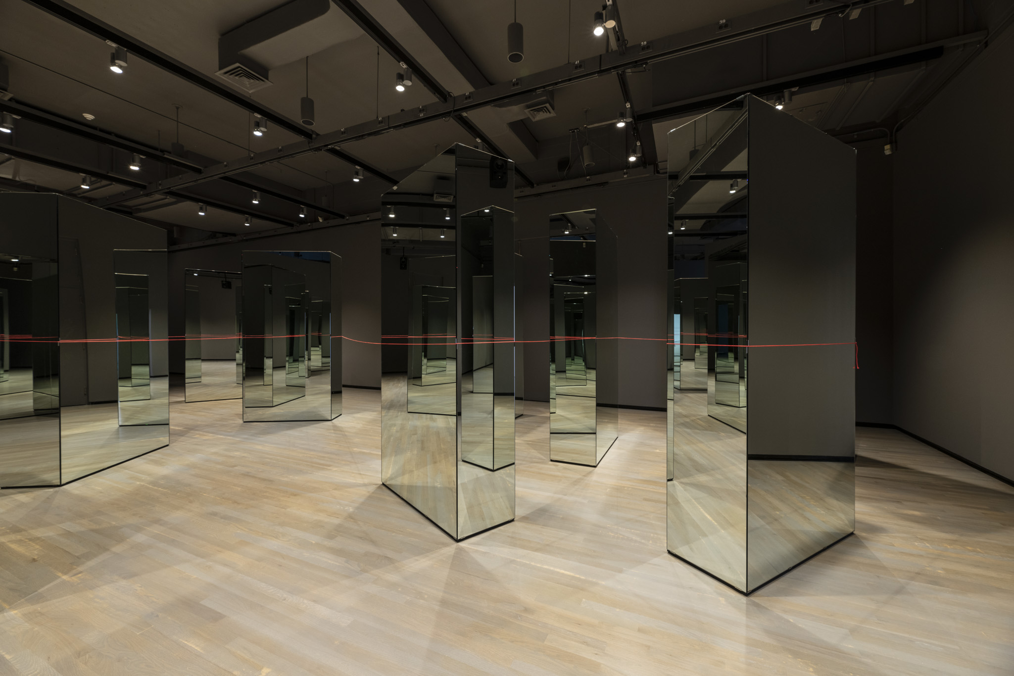 Installation view: Carmen Papalia, Red String (2015-ongoing), courtesy the artist. Walter Phillips Gallery, Banff Centre for Arts and Creativity. Photo by: Jessica Wittman.