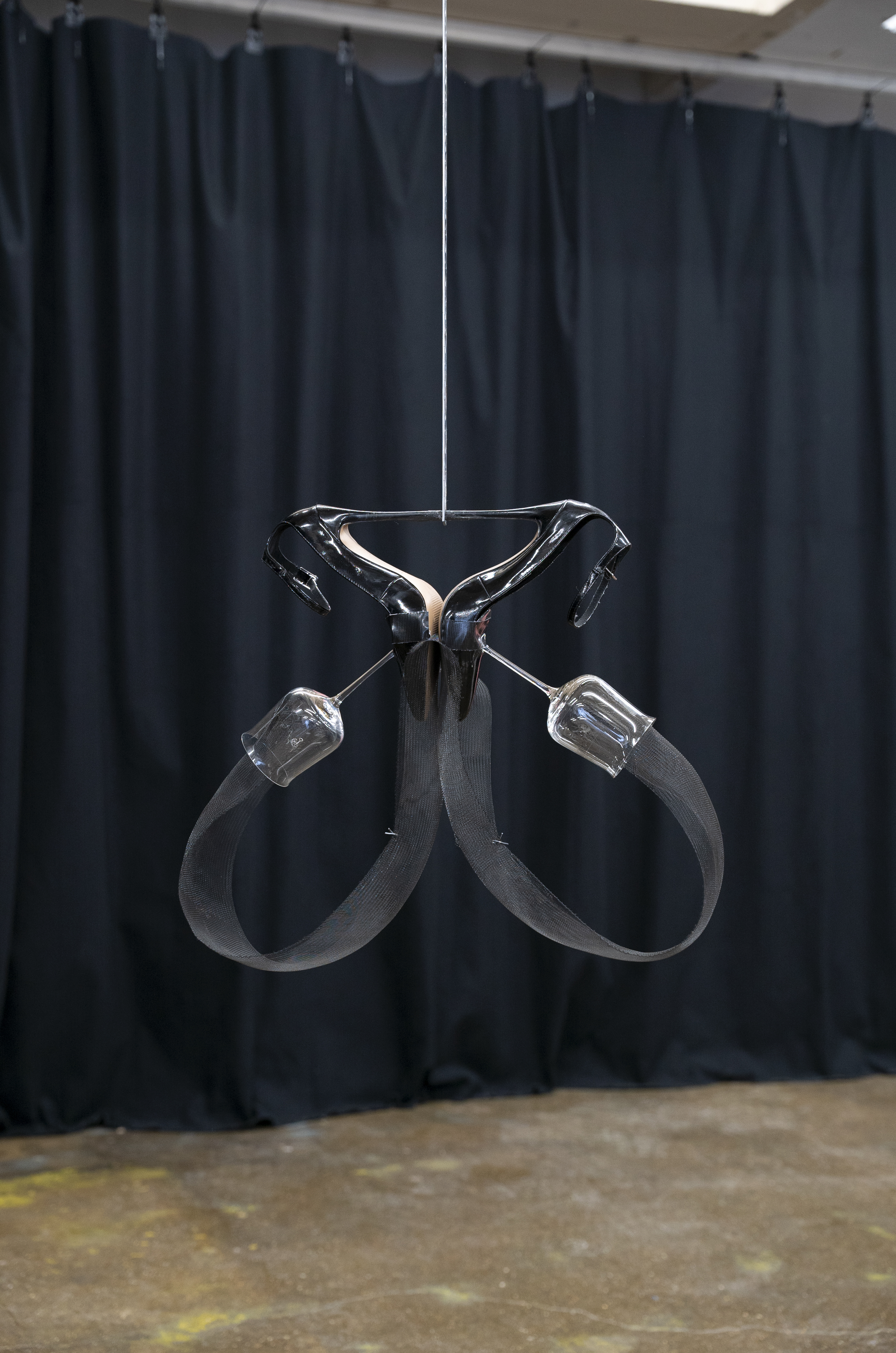 Ring I, 2022, High heels, Wine Glasses, Steel, Horse-hair braid, Tape, Epoxy putty.