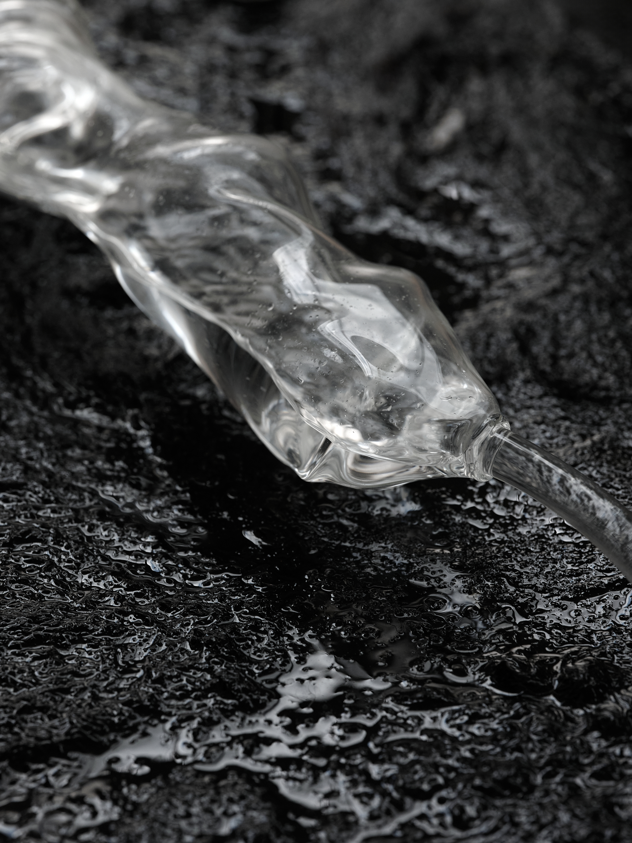 Future Obscura, 2025, [120m x 80cm x 65cm]  Art-O-Rama invited by Xxijra Hii Gallery, Marseille  Glass, water, eco resin, wool, aluminium, stainless steel, PVC tubing, water tank and pump. 