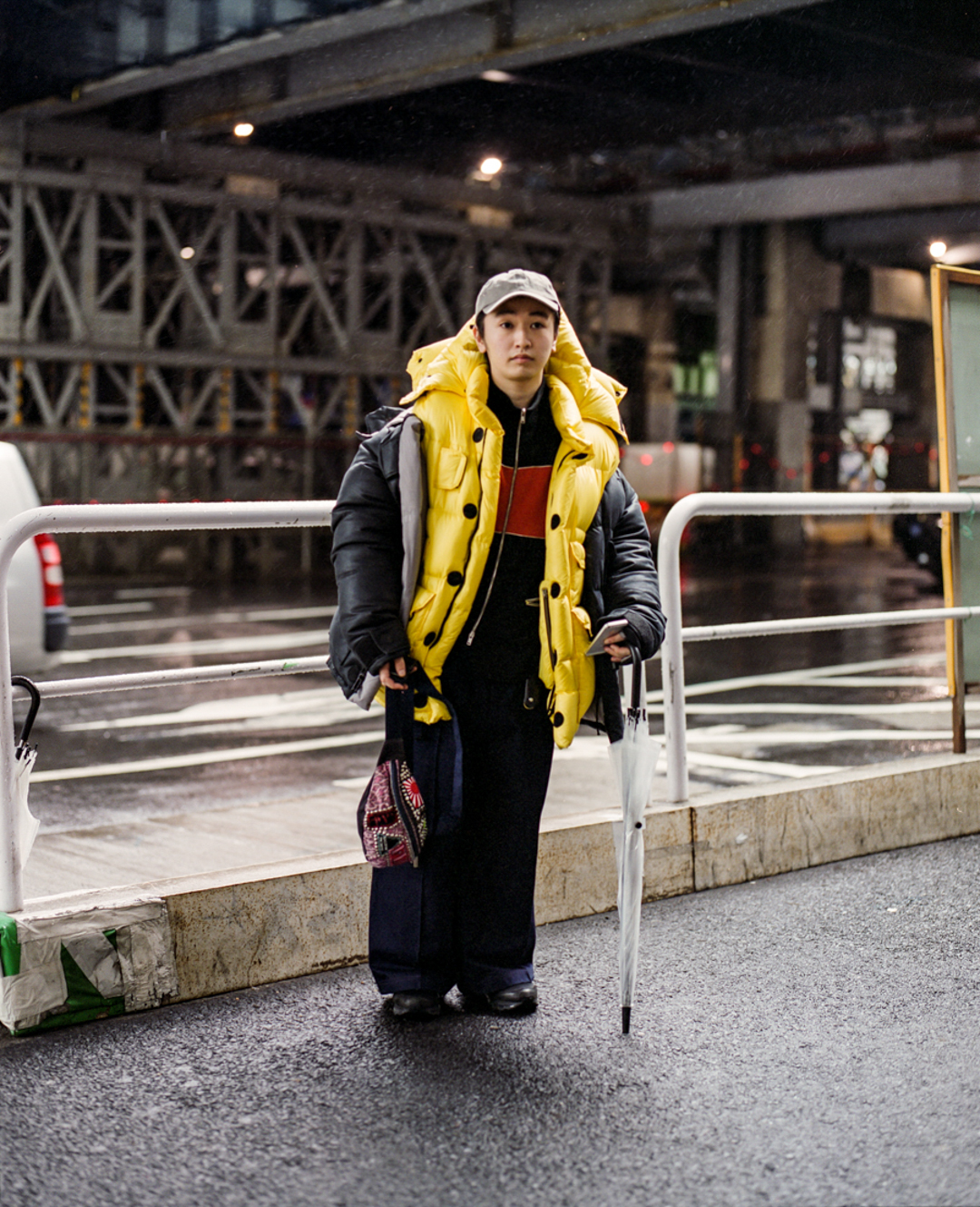 Young Japanese with layers of down puffers in Shibuya