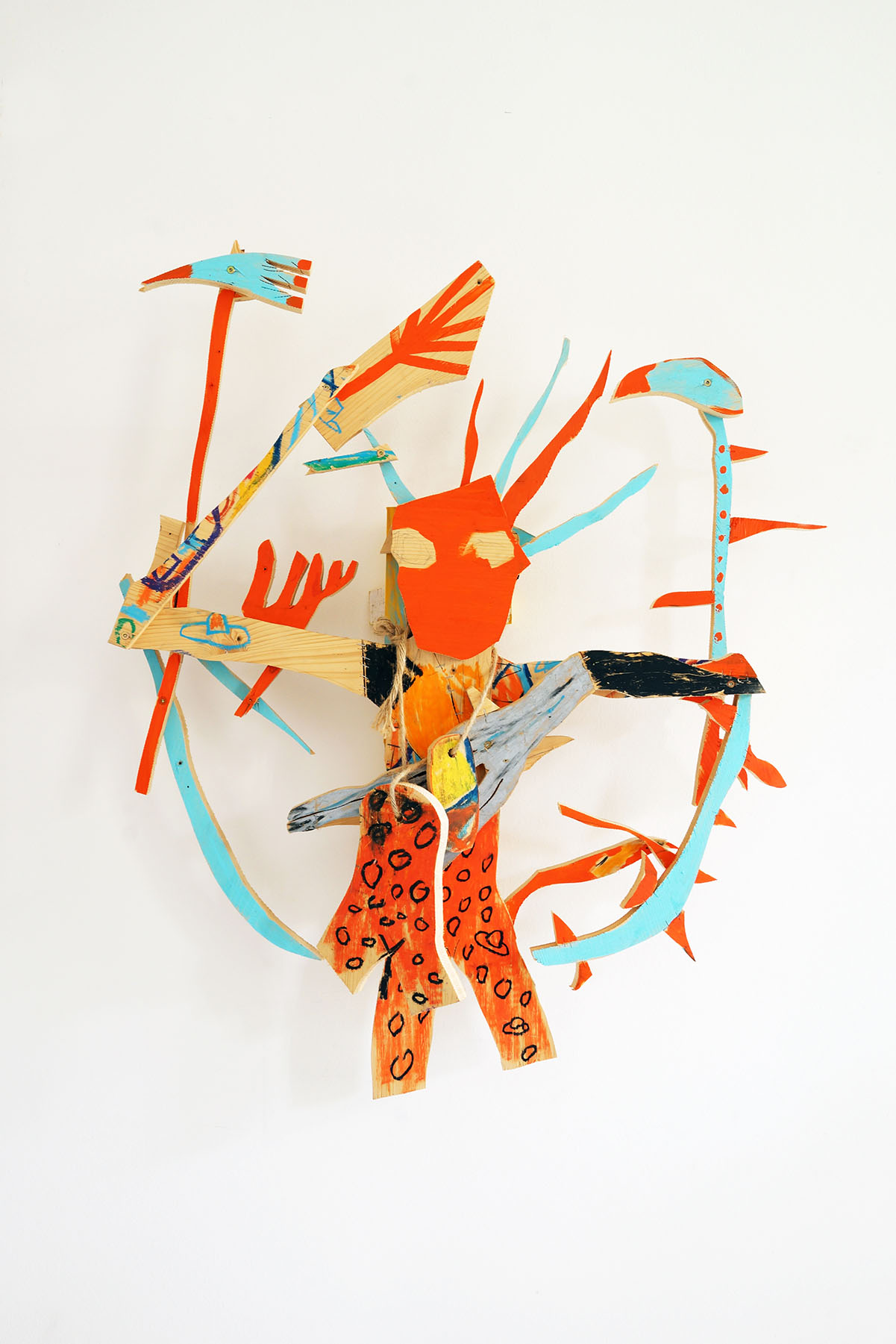 contemporary wood sculpture now and new, a figurative constructed painted wall sculpture