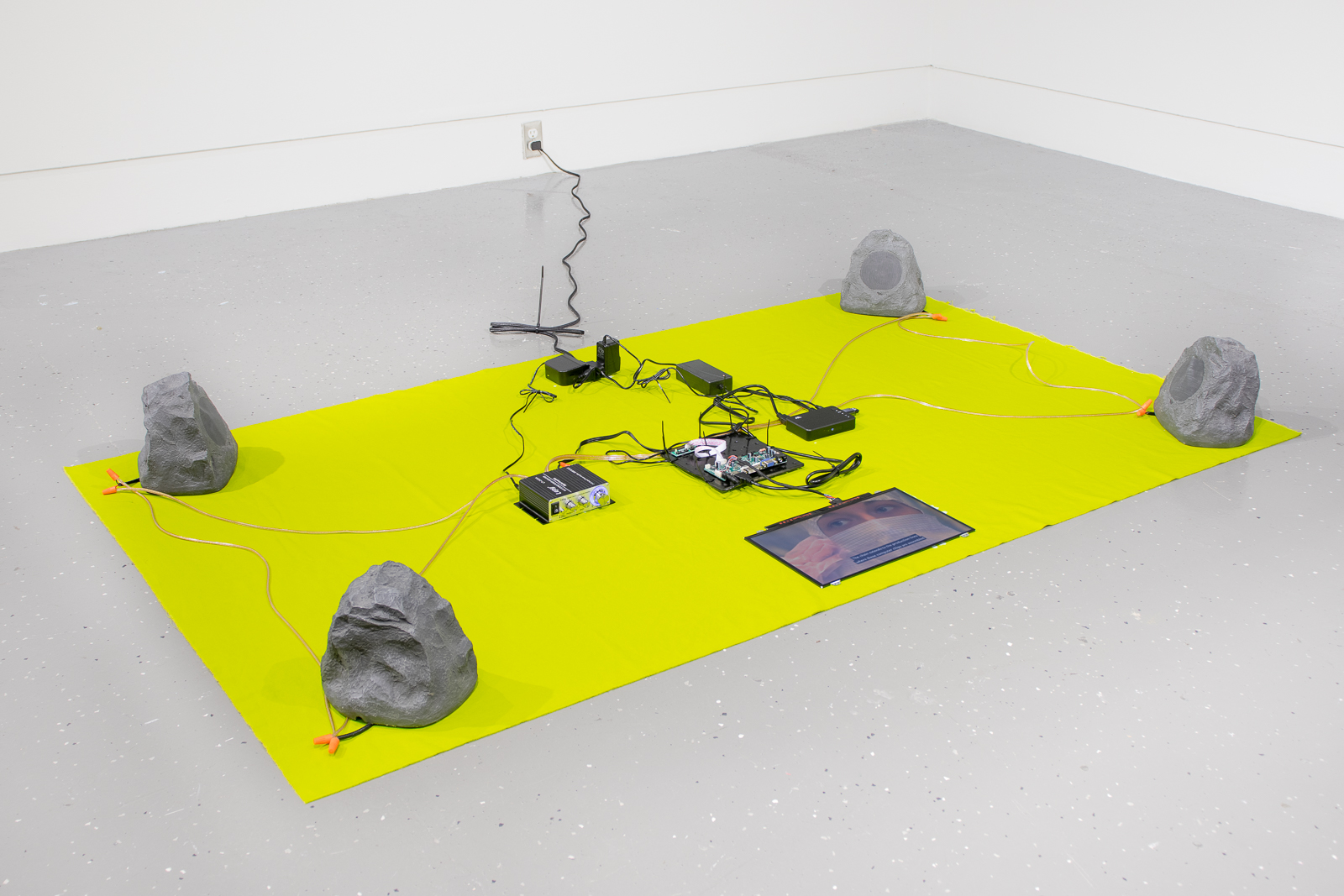 Thermochromic workflow, 2020, heat-sensitive fabric, led screens, led controllers, media players, flash drives, amplifiers, faux rock speakers, cables, each approximately 44 x 77 in. (112 x 196 cm)