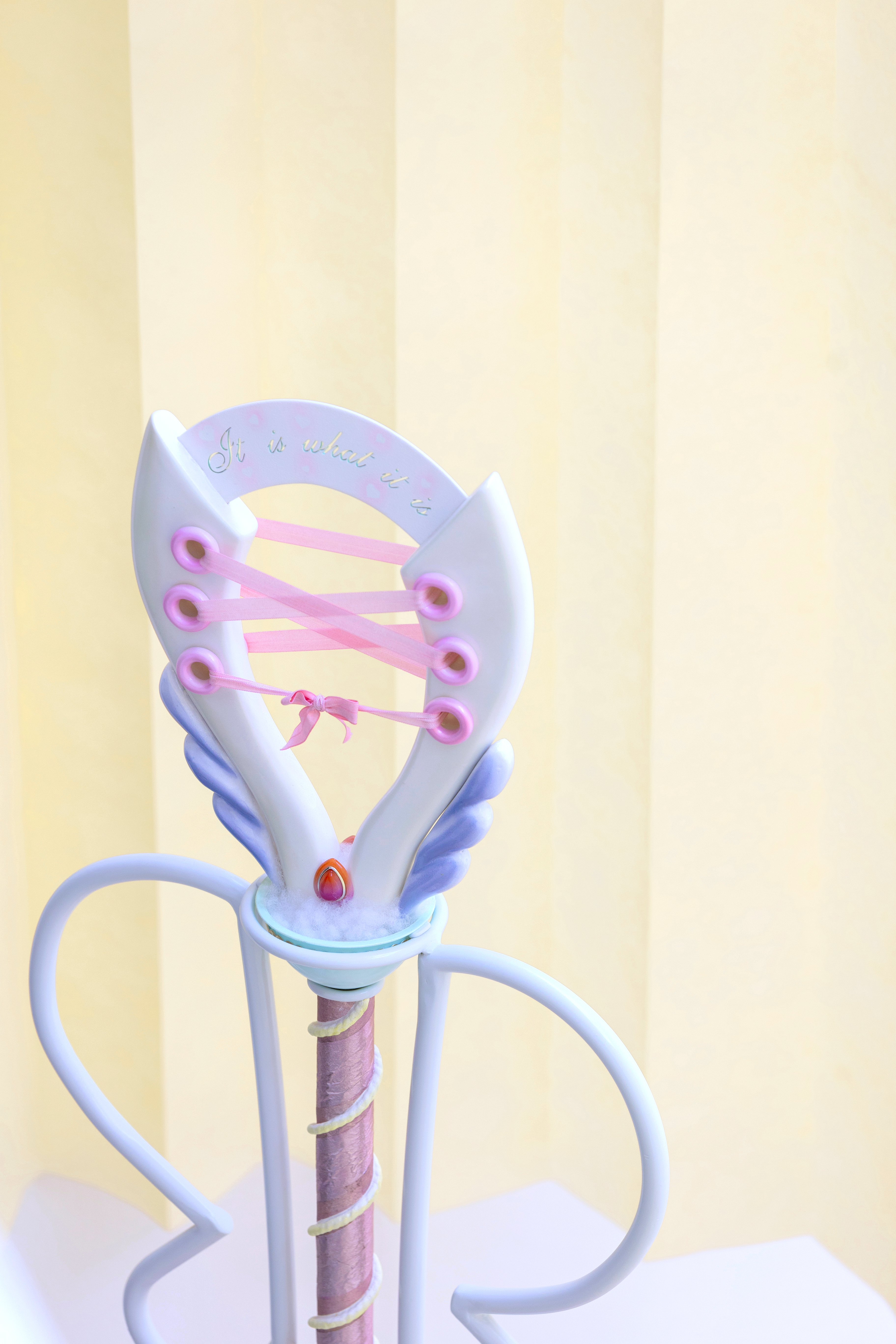 0- 'self-sabotage’ (2022) found objects, plaster, metal, walking stick ferrules, elastic, water, rope, hope.