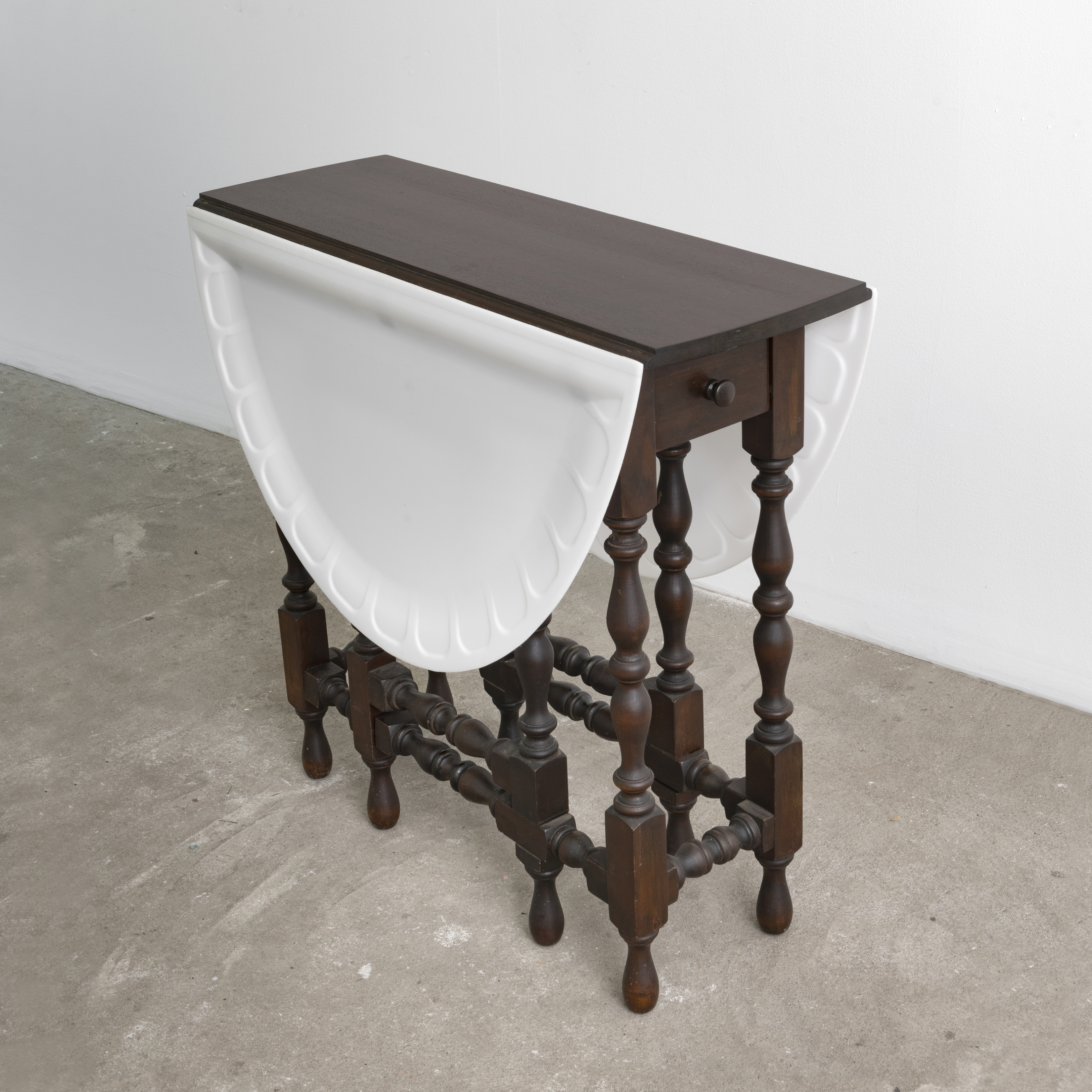 Wounded Table (closed), 2020, antique Maddox table and high-density polyethylene, 29 x 32 x 43.5 in