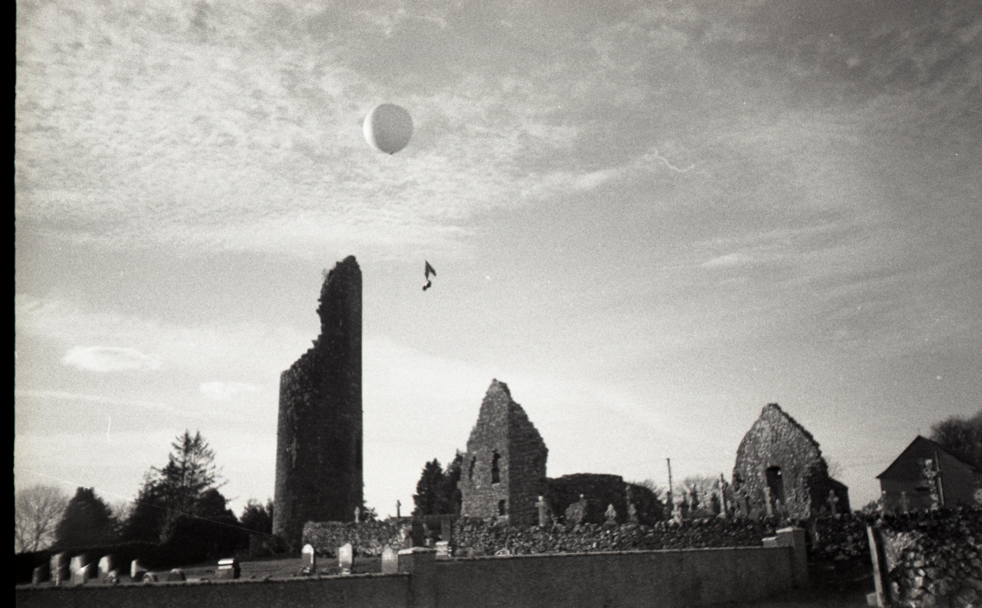 Space Bible (2020) Bible, Weather Balloon, Toy Rocket Parachute, Analog Photography.