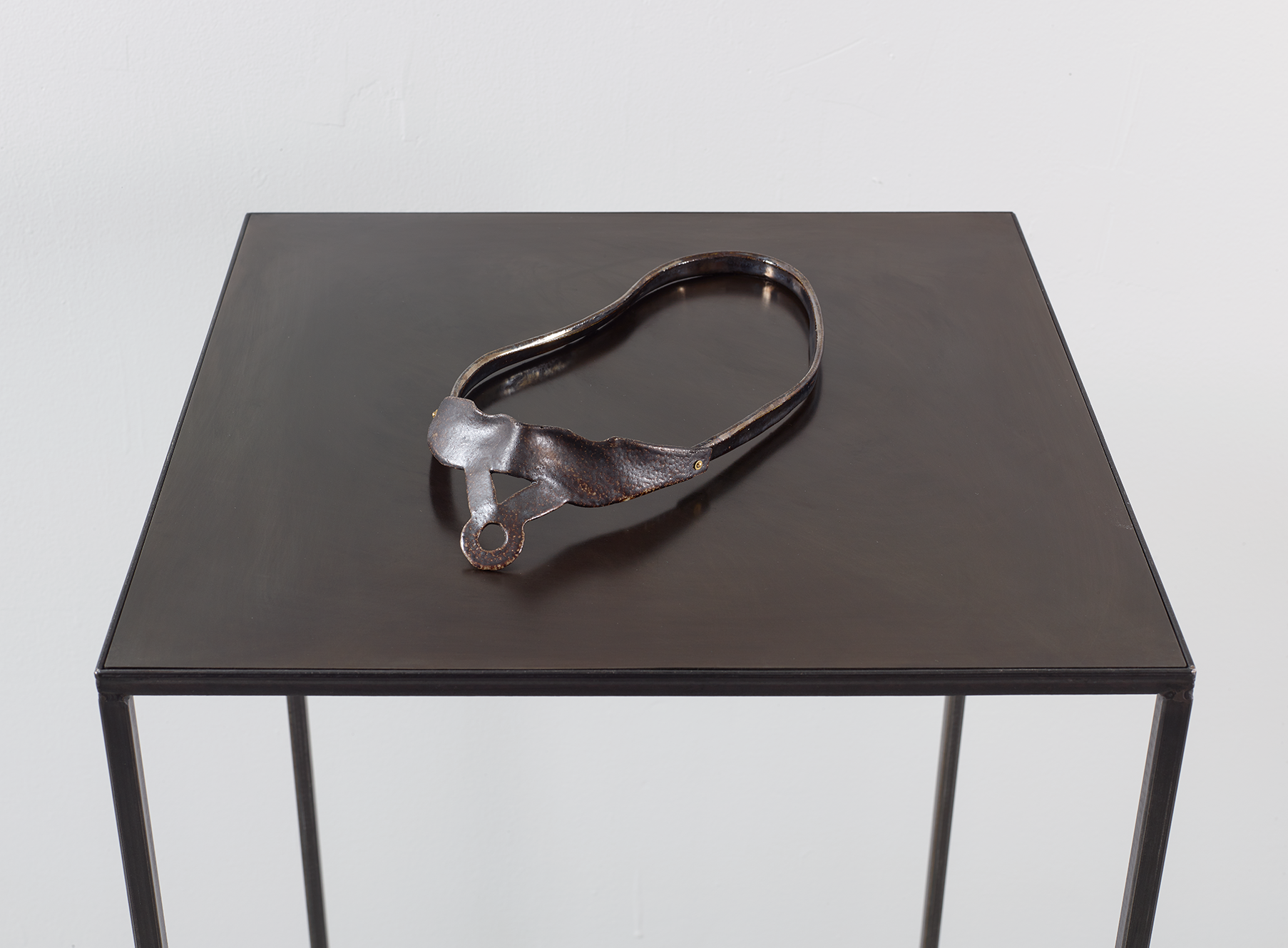 Muter (#2) ; 2017 ; 4½ x 22 x 28 cm ; 2 x 8¾ x 11¼ inches ; partially salt glazed ceramics, brass screws, metal pedestal