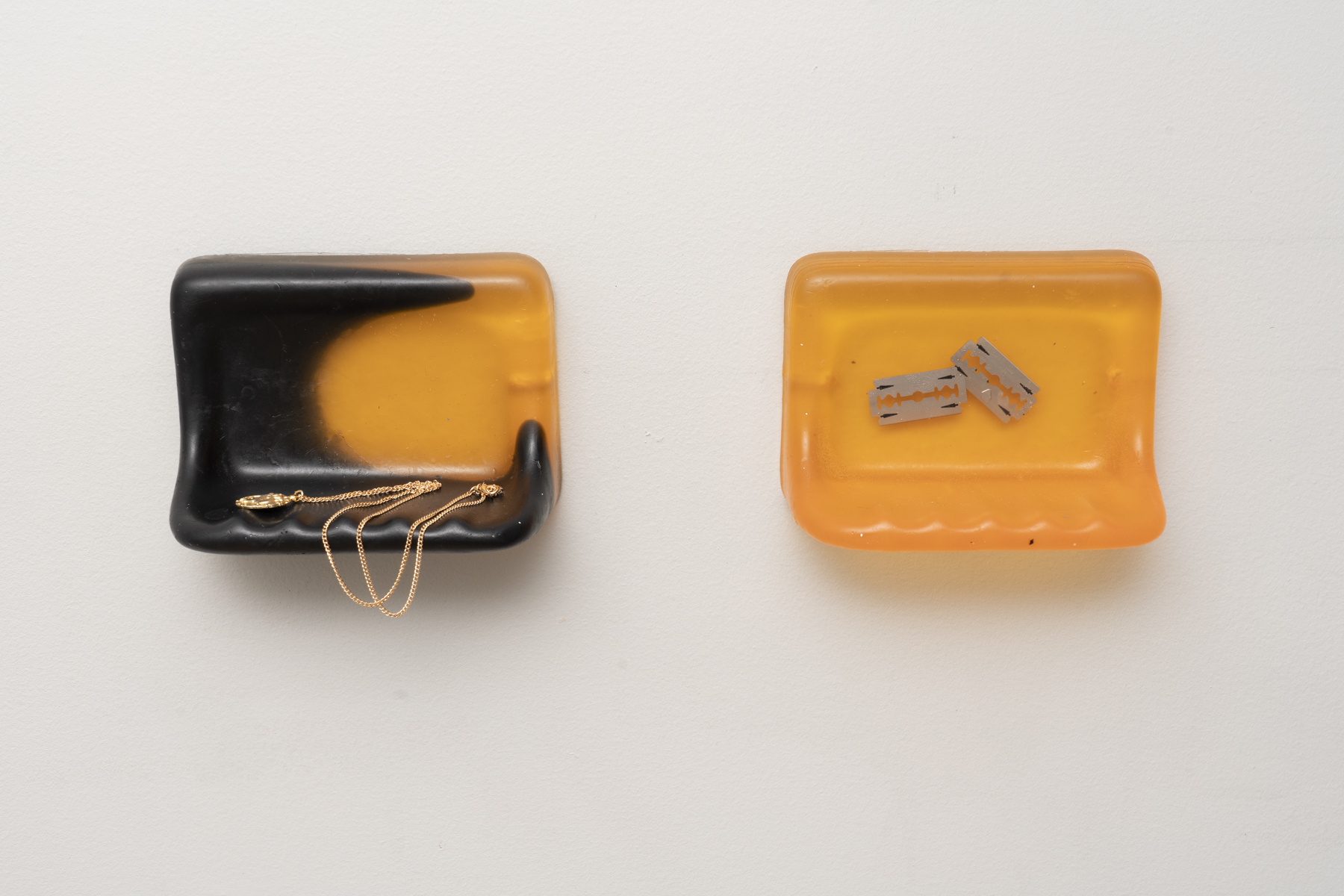 Hostings; soap, chain necklace, medallion, razor blades Photography: Jesse Meredith