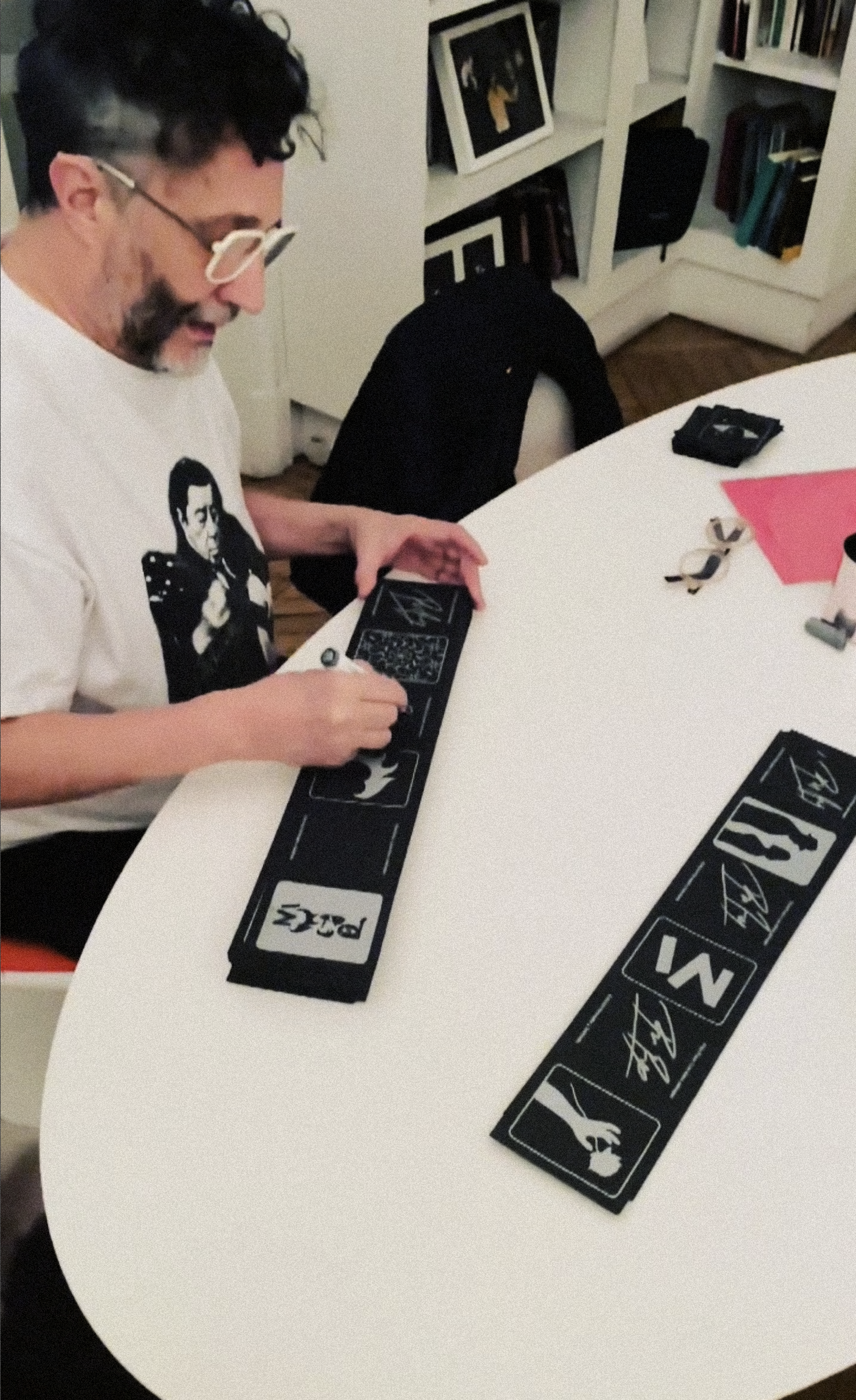 Paez signing authenticity certificates (Click to open)