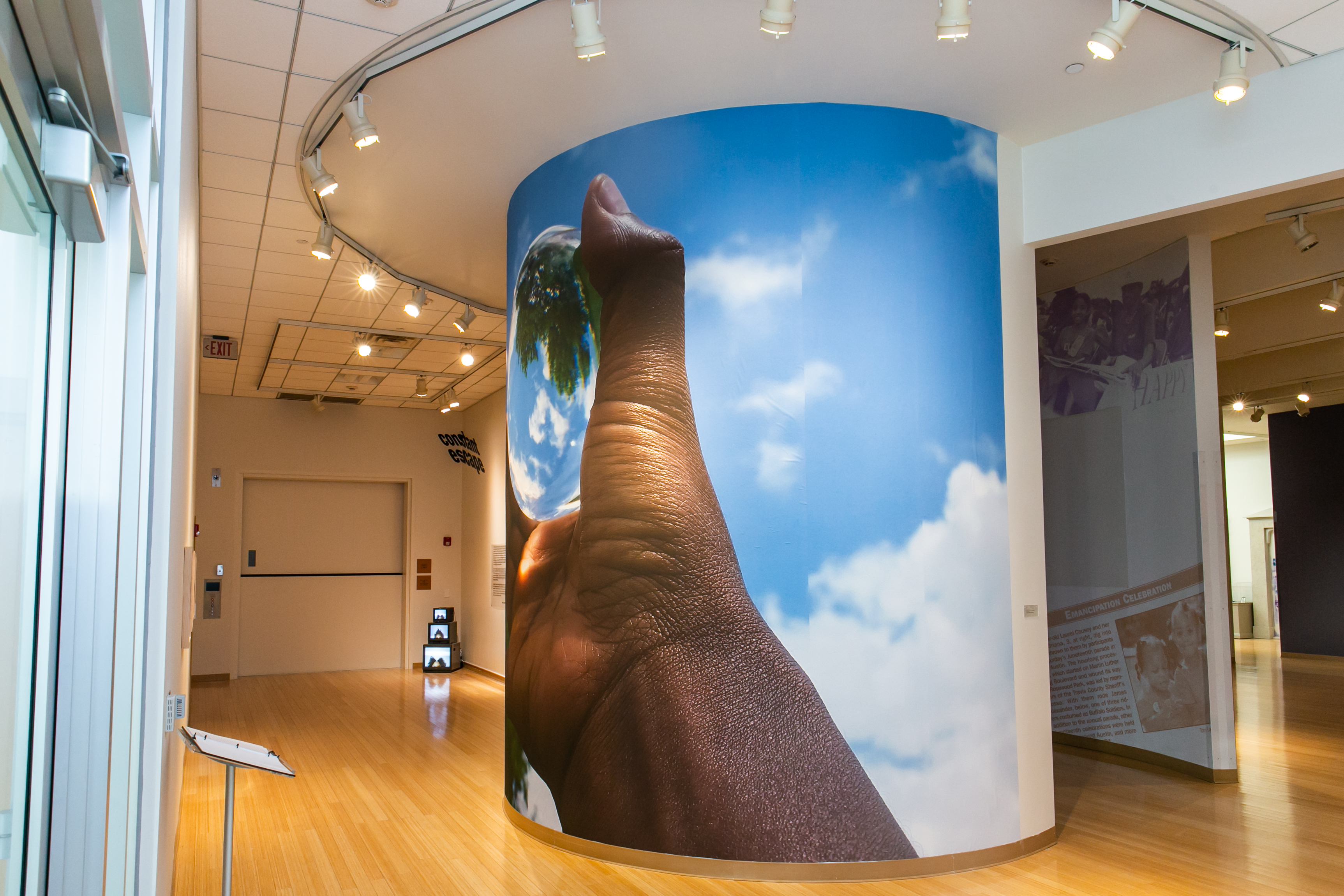 untitled (constant escape / this is not a metaphor) adhesive wall vinyl 2019 3 in x 5 in, adjusted to meet wall dimensions. Photo credit: Jeanette Nevarez