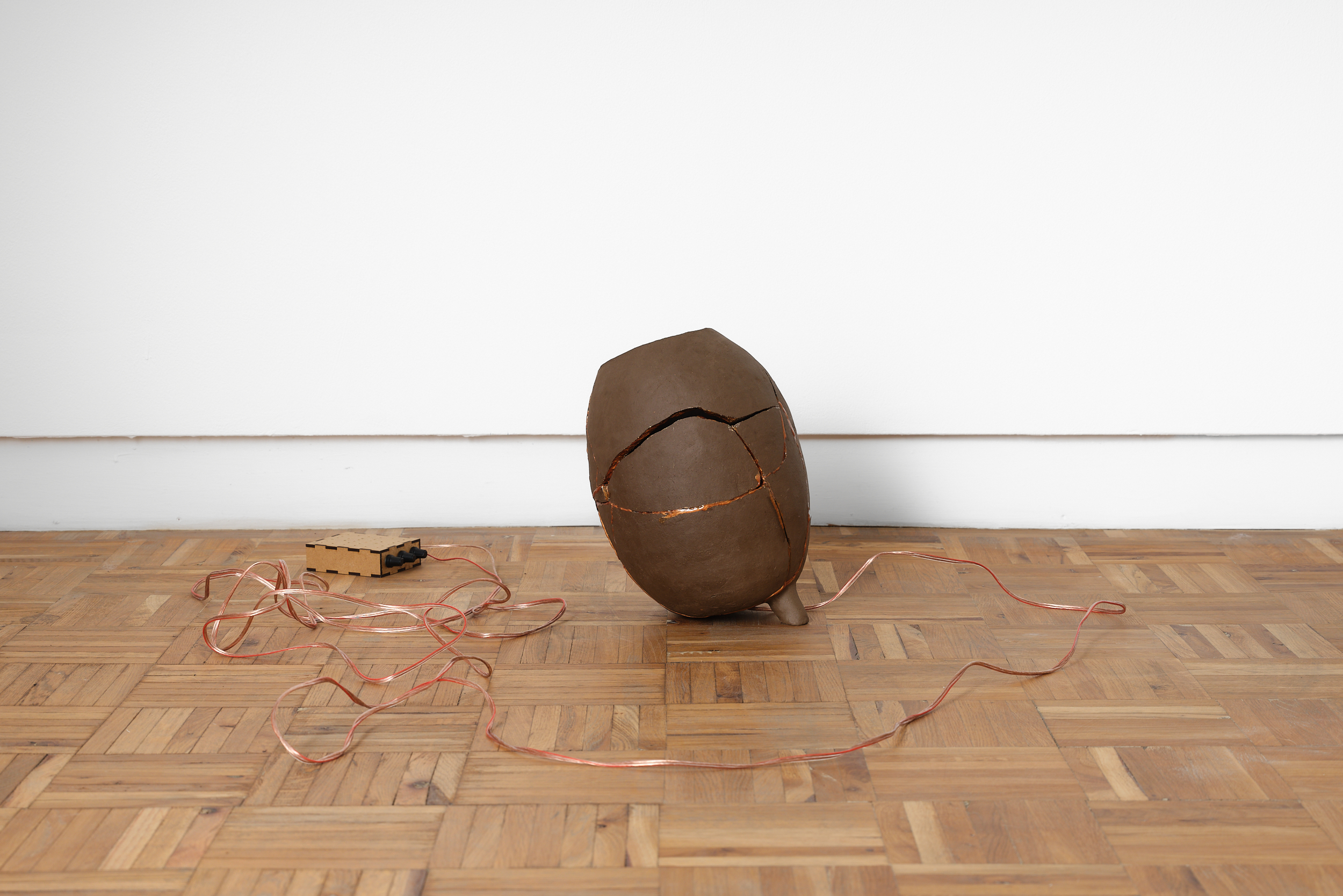 donna Kukama, Alchemies for watermelon futures (Palestine) (2025) | Ceramic, epoxy resin, copper powder, speaker, audio, cables, approx. 30 x 20 x 20 cm