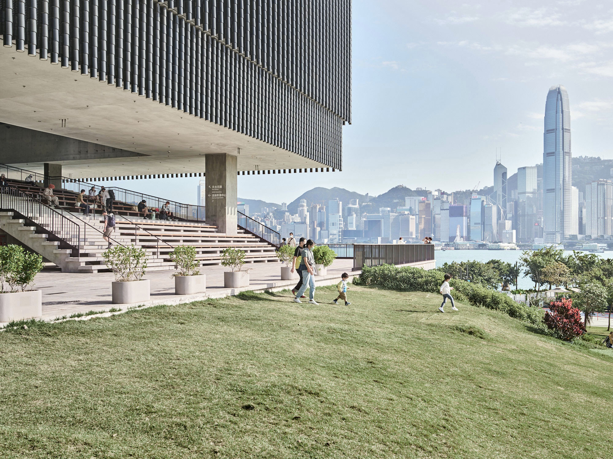 M+ Museum Outdoor staircase seating area, facade, IFC, HK skyline, children