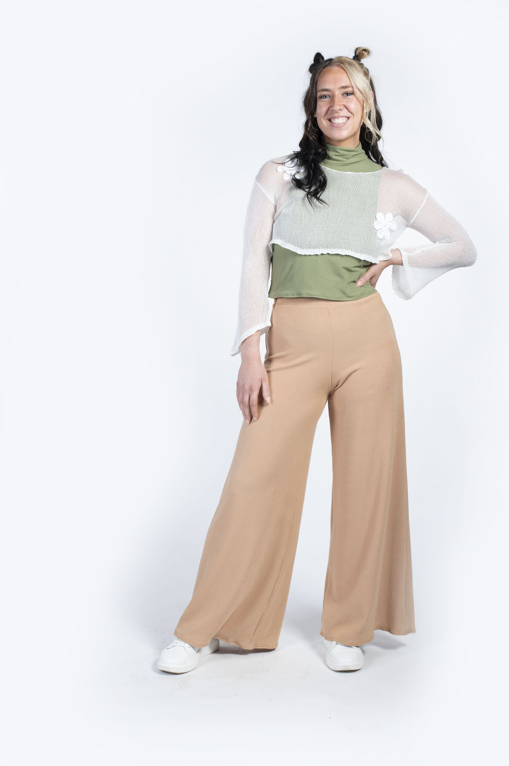 Season of Growth - Look #1Materials: Mercerized cotton yarn, bamboo yarn, rayon/polyester/spandex blend, polyester/spandex blend, Size 8 PGM, 2022Photographer: Amanda Bizarro