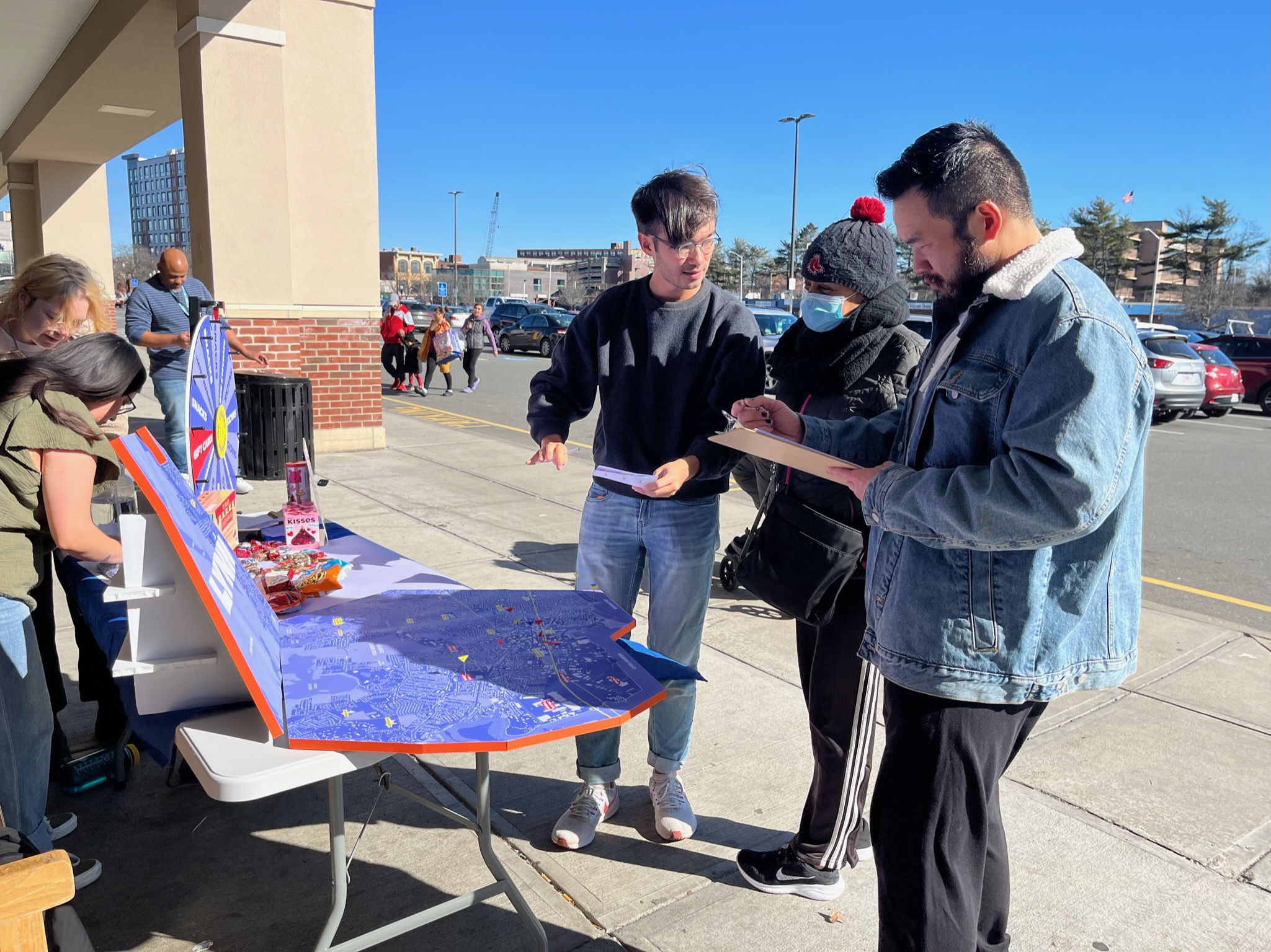 Students conduct intercept surveys in Downtown Lynn in Spanish and English