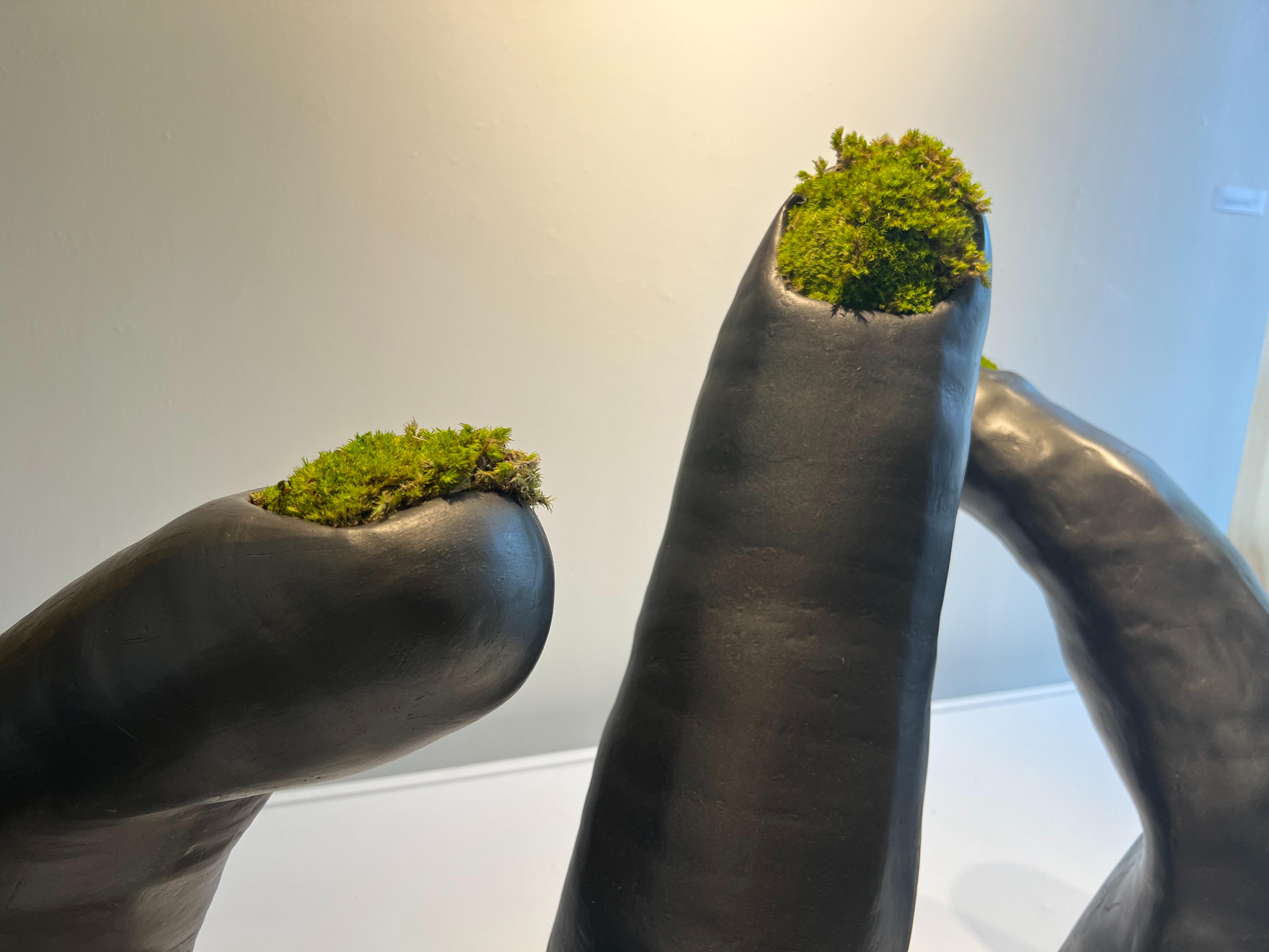 Playing Dress Up (Painted Fingernails) #1-5. 2020–21. Each piece approx. 14 x 36 x 9 inches. Earthenware, epoxy paste, enamel paint, moss.