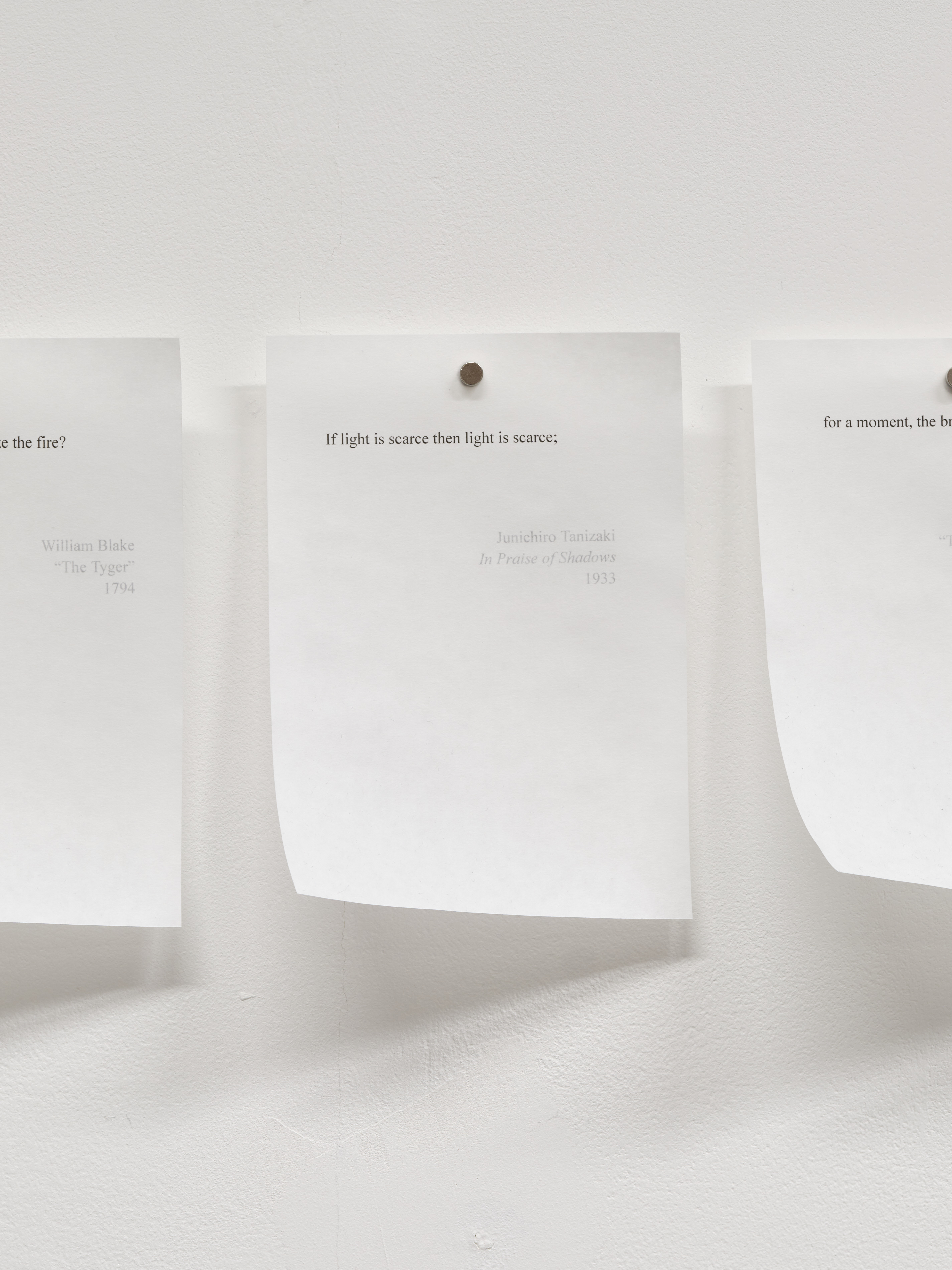 Poem in High Contrast, 2025. Inkjet print on tracing paper with magnets.
