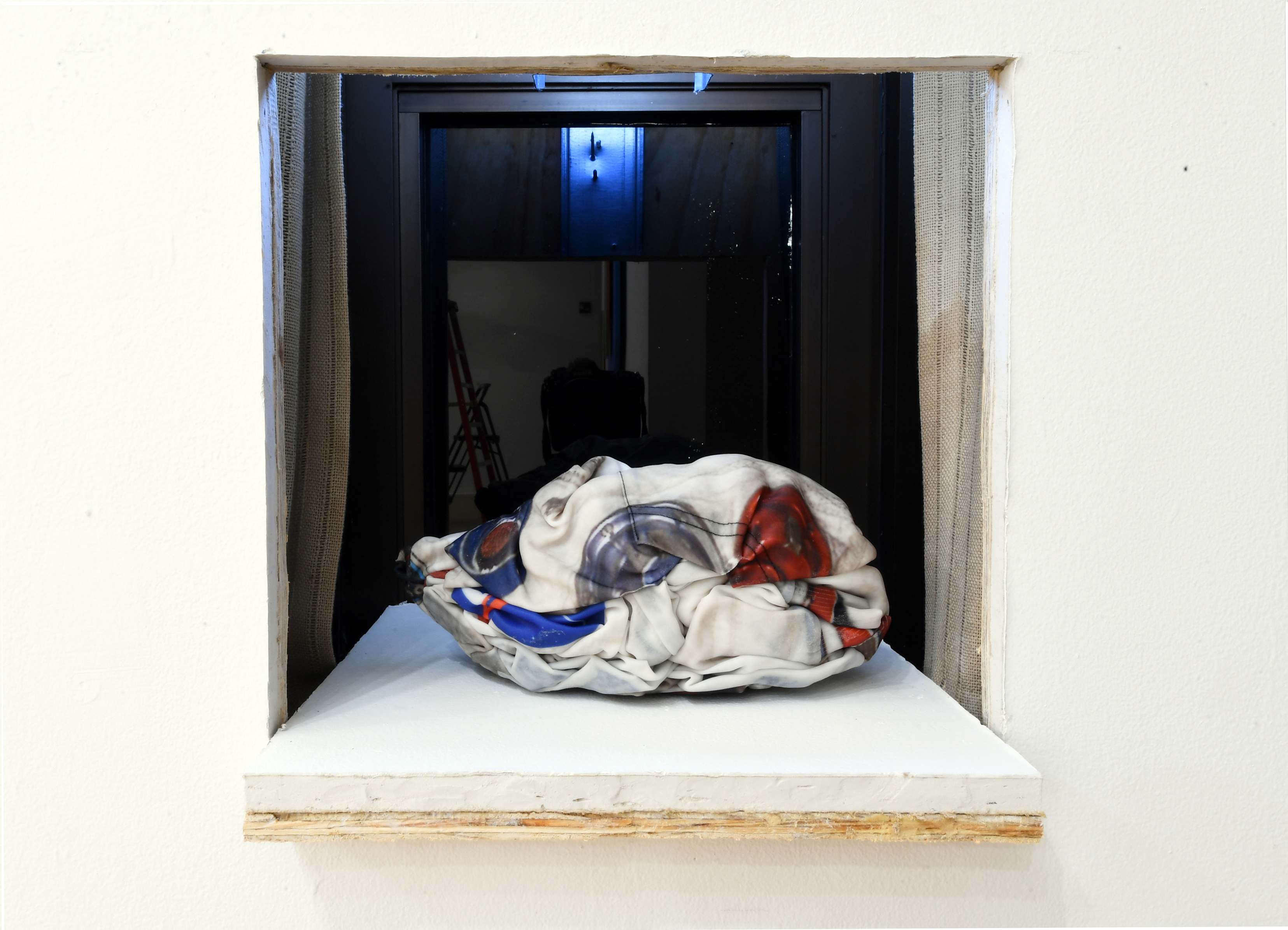 Alex HaydenWindow Excavation, 2019Architectural Intervention14 x 14 inchesCourtesy of the artistPhoto: Jad NammourAlex Hayden15555,00, 201950th anniversary space suit hoodieresinDimensions variableCourtesy of the artistPhoto: Jad Nammour