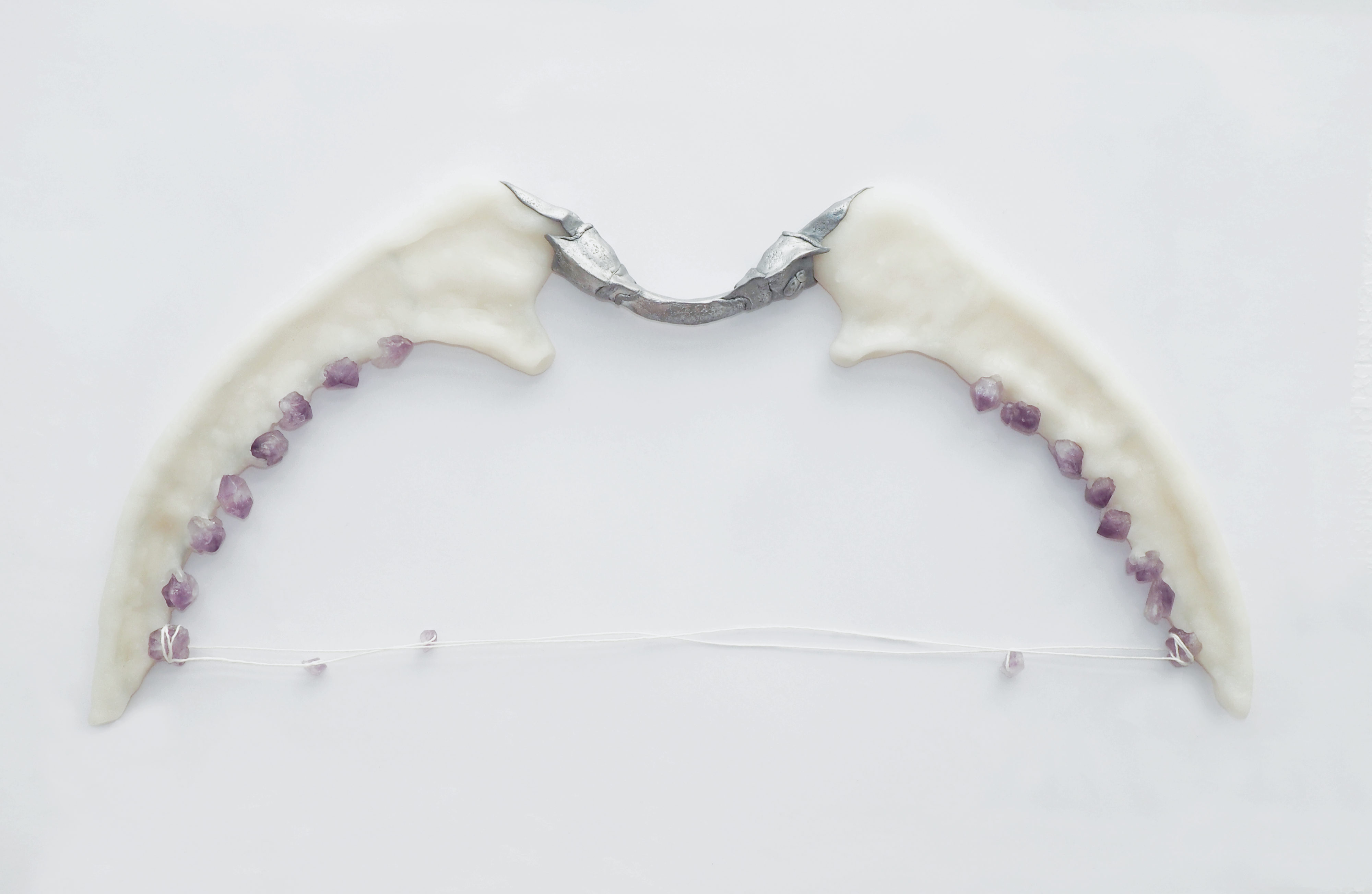 Toys, Bow, 2025 Plastic clay, raw amethyst stones, linen thread, stainless steel armature, mica powder 18 1/8 x 9 in 46 x 23 cm