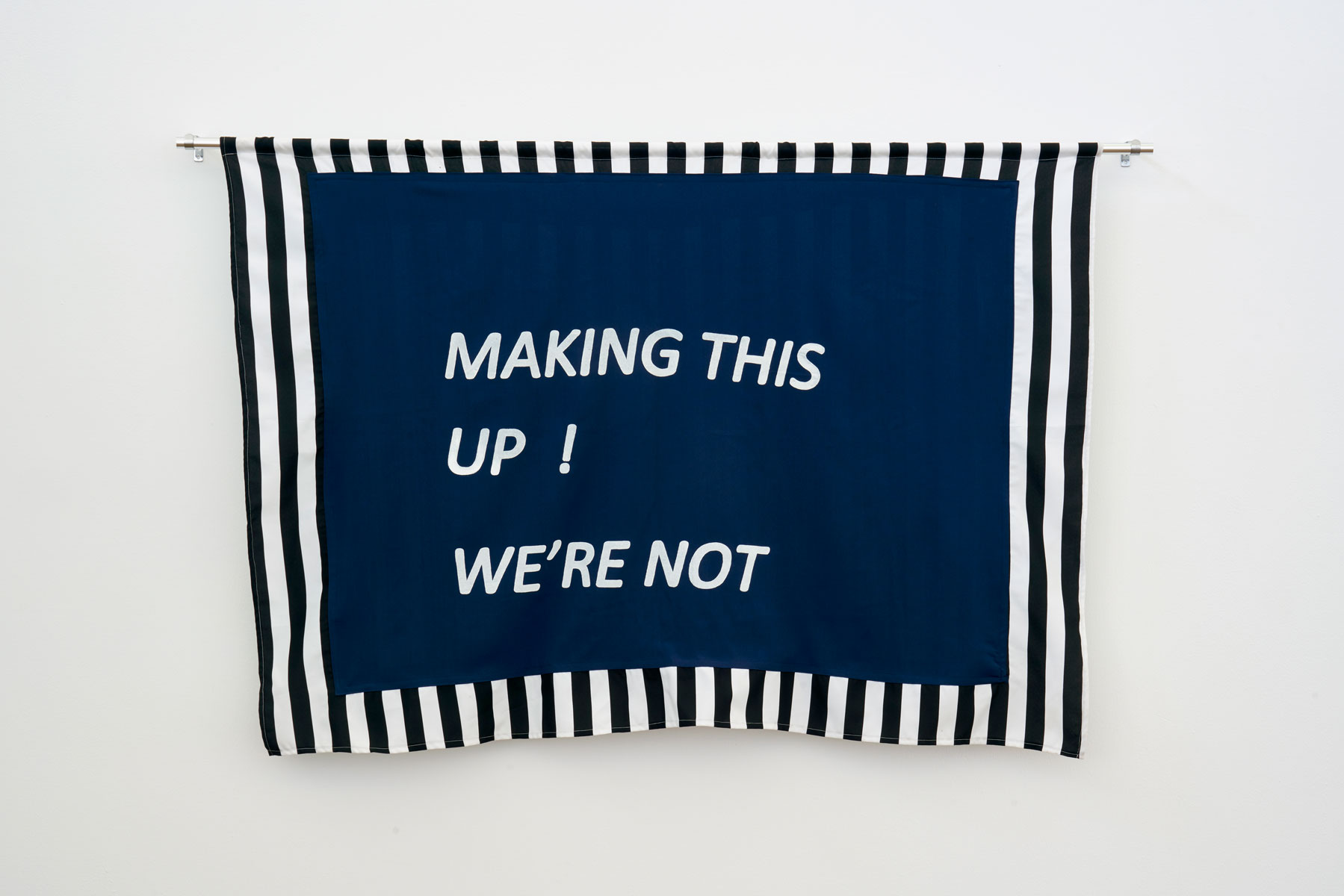 Simnikiwe Buhlungu, MAKING THIS UP ! WE’RE NOT (2017) | Silkscreen banner, 70 x 100 cm | Courtesy of private collection, Johannesburg
