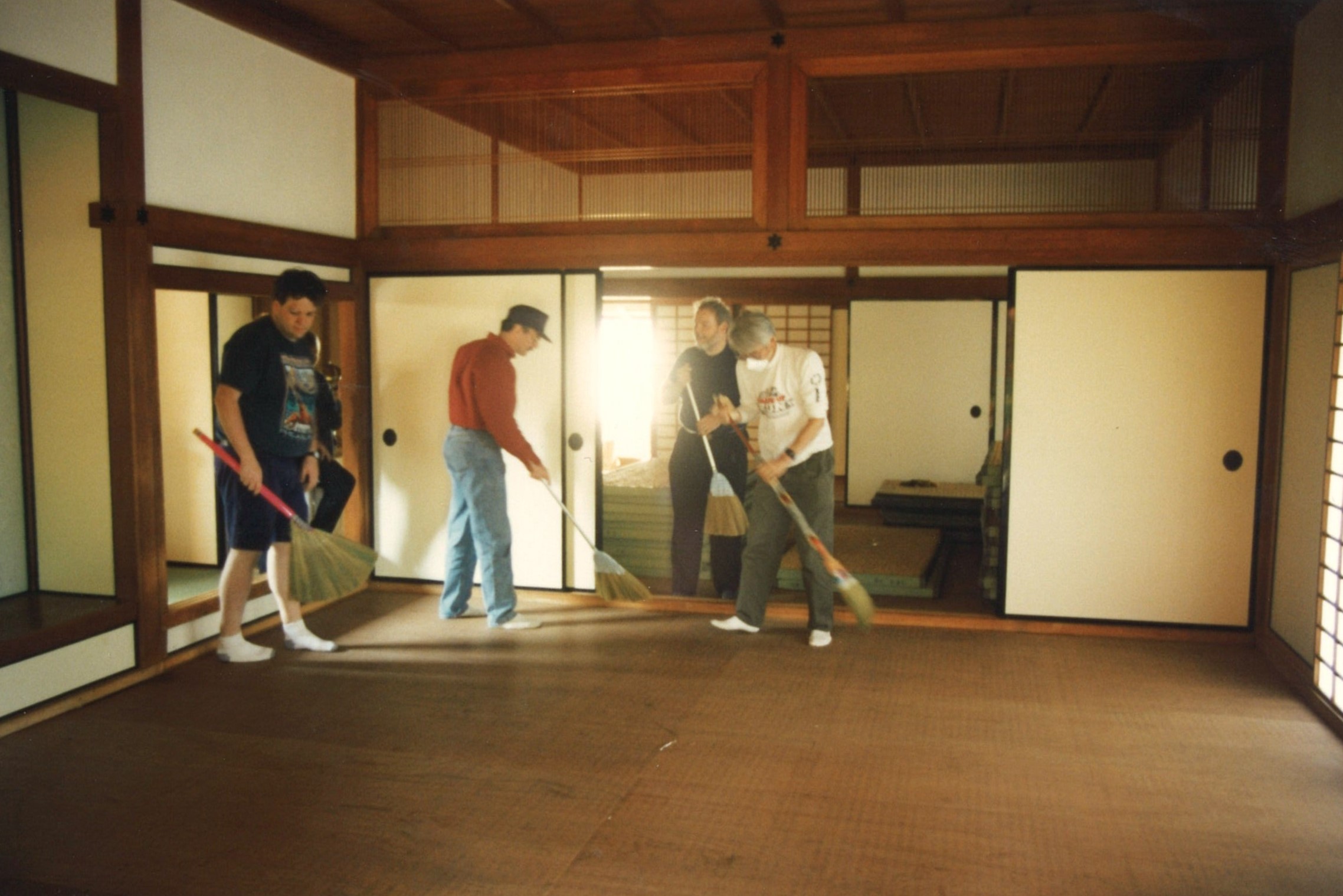 Volunteers and board members cleaning the house, 1995