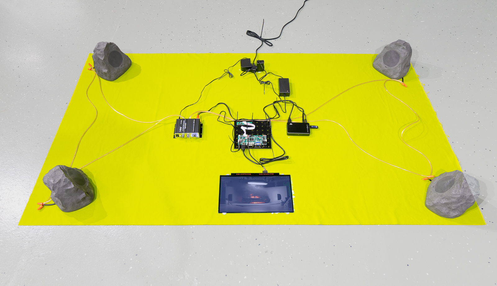 Thermochromic workflow, 2020, heat-sensitive fabric, led screens, led controllers, media players, flash drives, amplifiers, faux rock speakers, cables, each approximately 44 x 77 in. (112 x 196 cm)