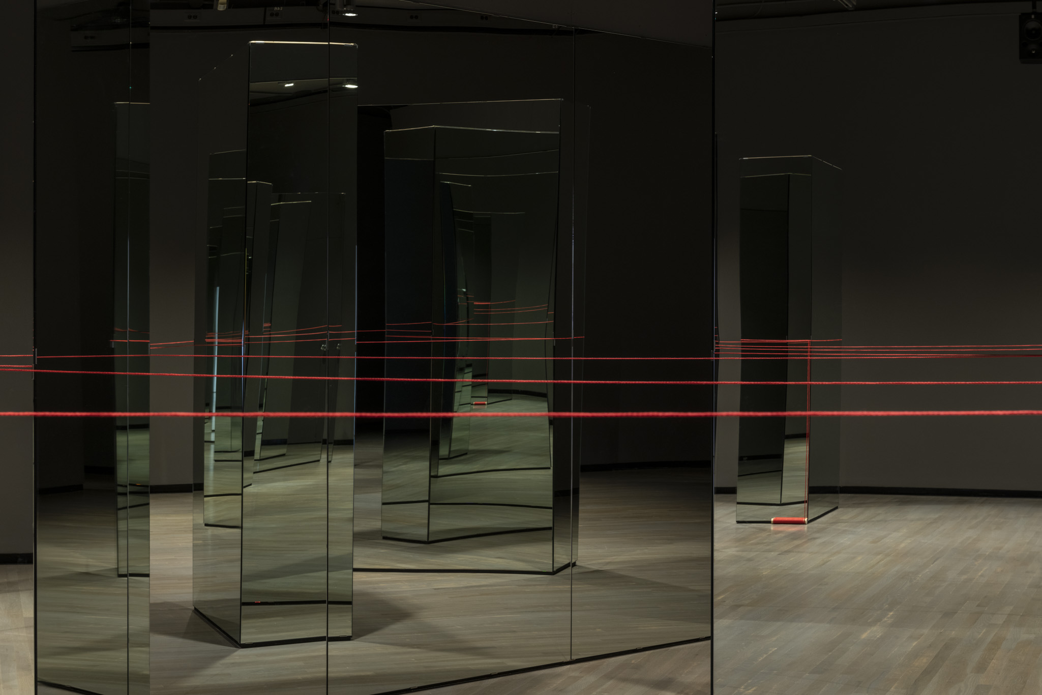 Installation view: Carmen Papalia, Red String (2015 ongoing), courtesy the artist. Walter Phillips Gallery, Banff Centre for Arts and Creativity. Photo by: Jessica Wittman.