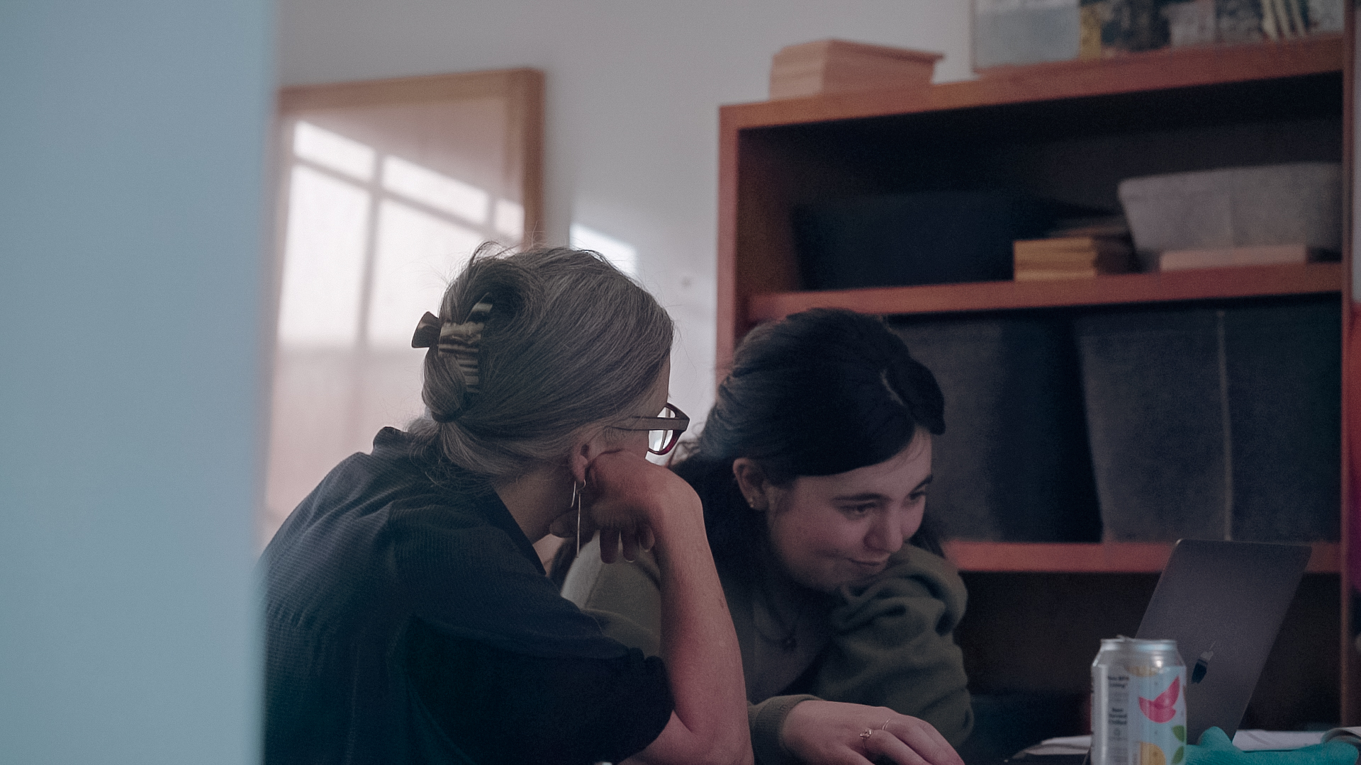 Leslie and Miro work on company logistics.