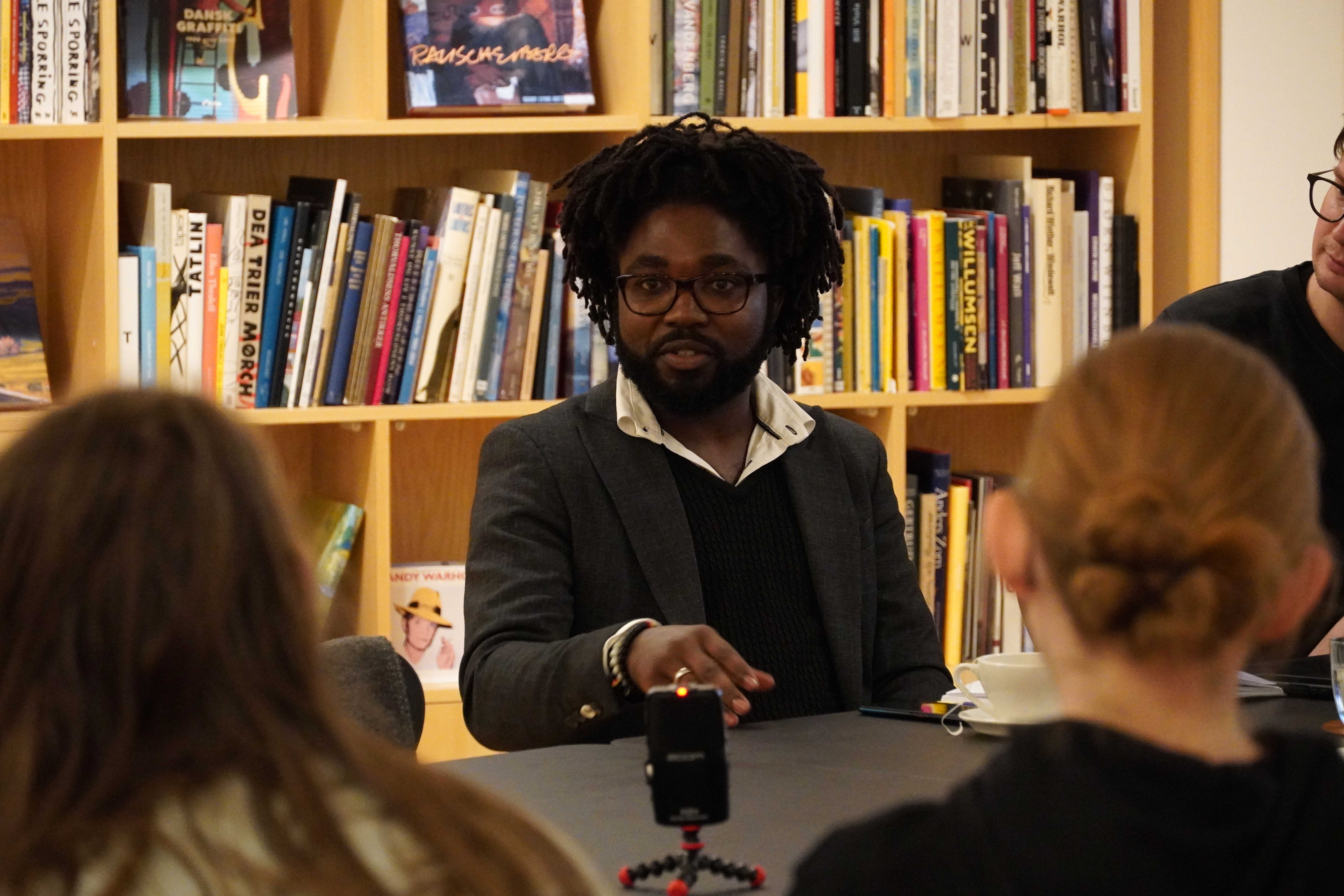 Documentation of Introducing Kinkurimba (Presentation & Discussion), Kabila Kyowa Stephane in collaboration with f.eks. and Livingstone Office for Contemporary Art (LoCA) featuring Joseph Chembe (Joe Sage), Luyando Muleya, Banji Chona, Scott William Raby, and Rikke Ehlers Nilsson, Kunsten Museum of Modern Art Aalborg, Aalborg, 2024 (photocredit: Rikke Ehlers Nilsson)