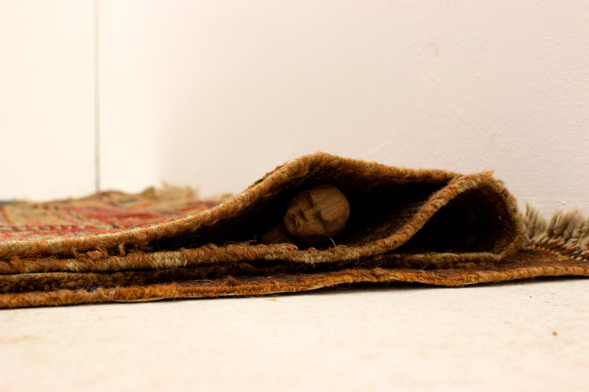 detail carpet and wooden objects, 150cm high by 4cm