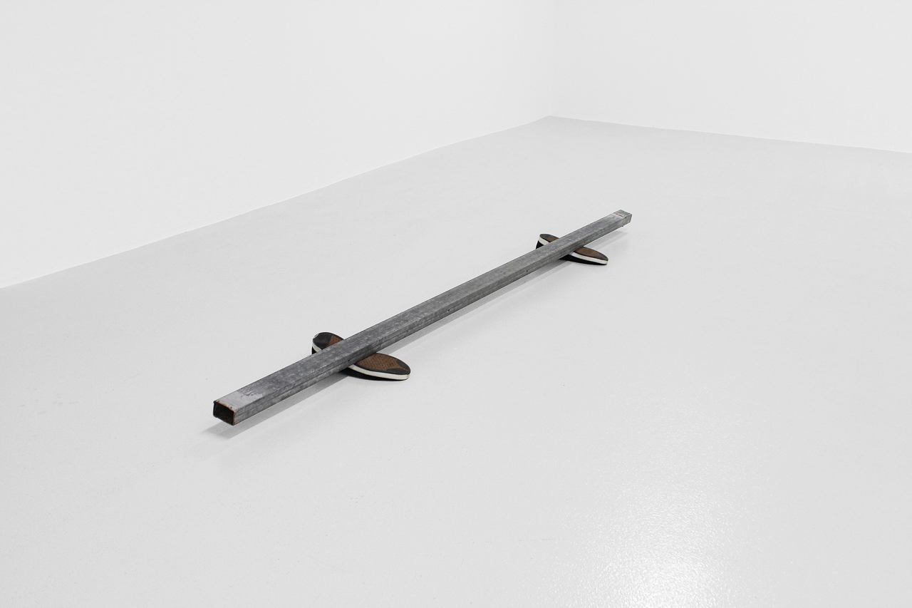 I remember better days, 2018. Found iron bar, used old shoes. 29 x 237 x 15 cm.