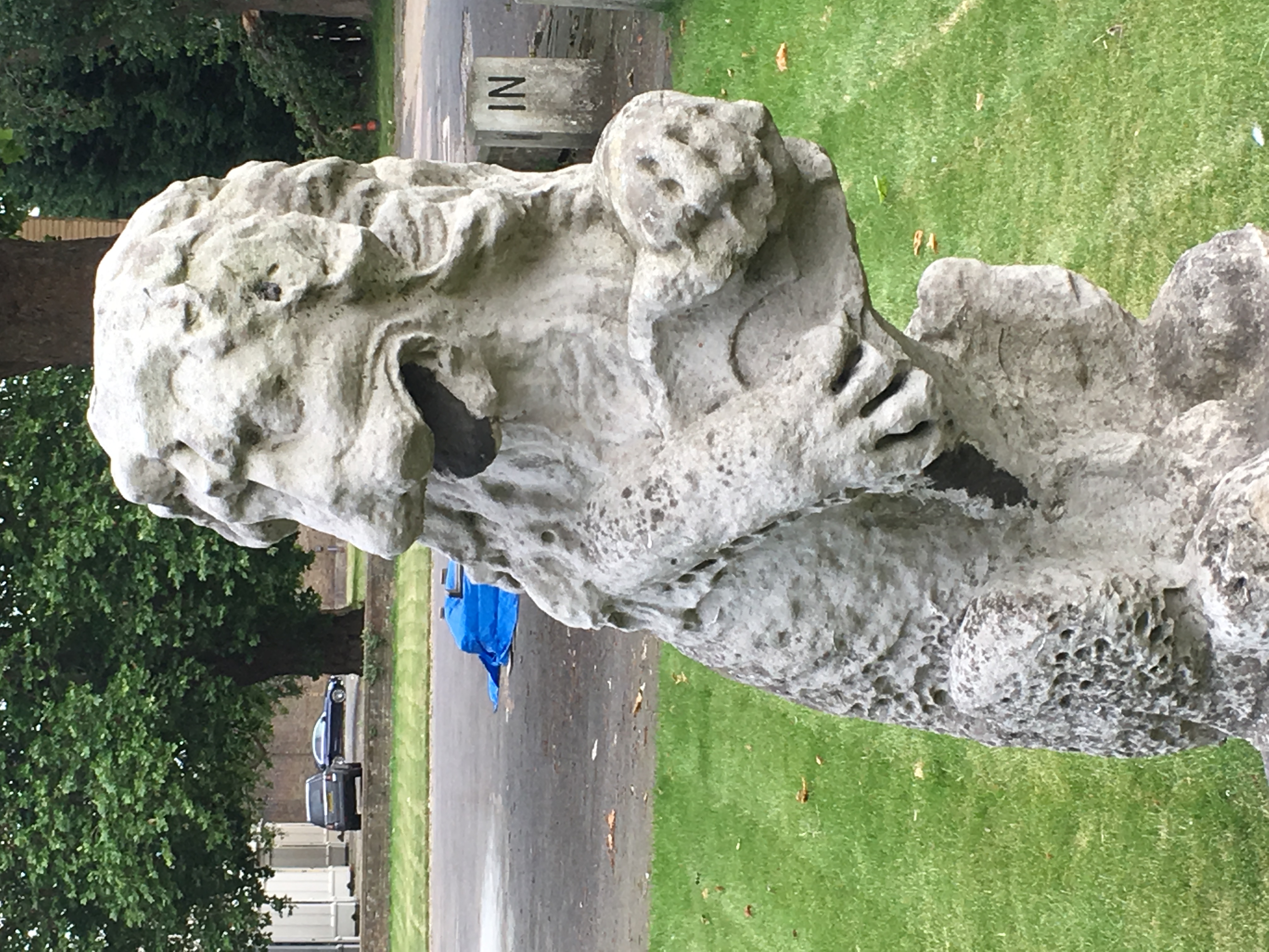 Weathered lion, inside dockyard