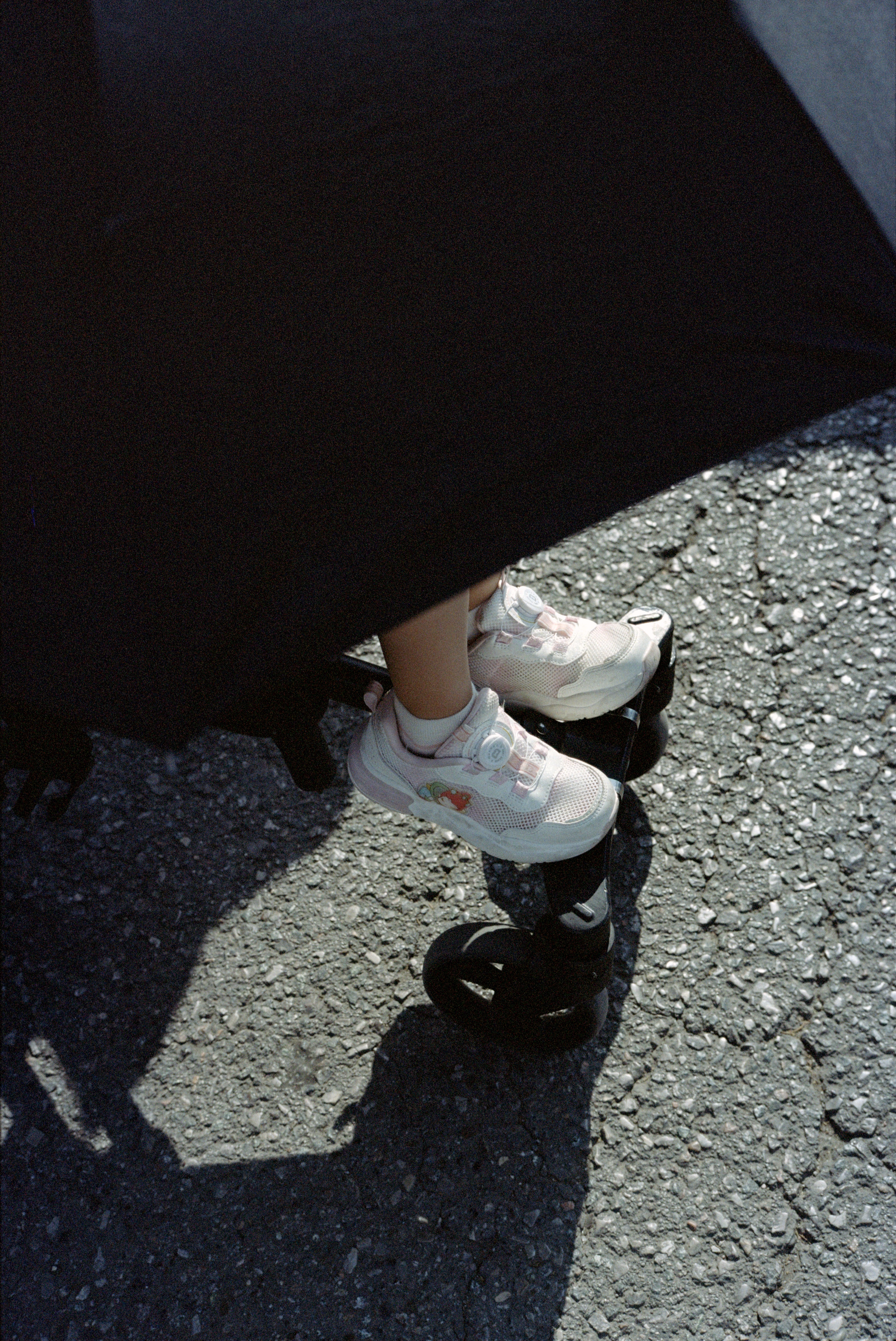 Child under umbrella