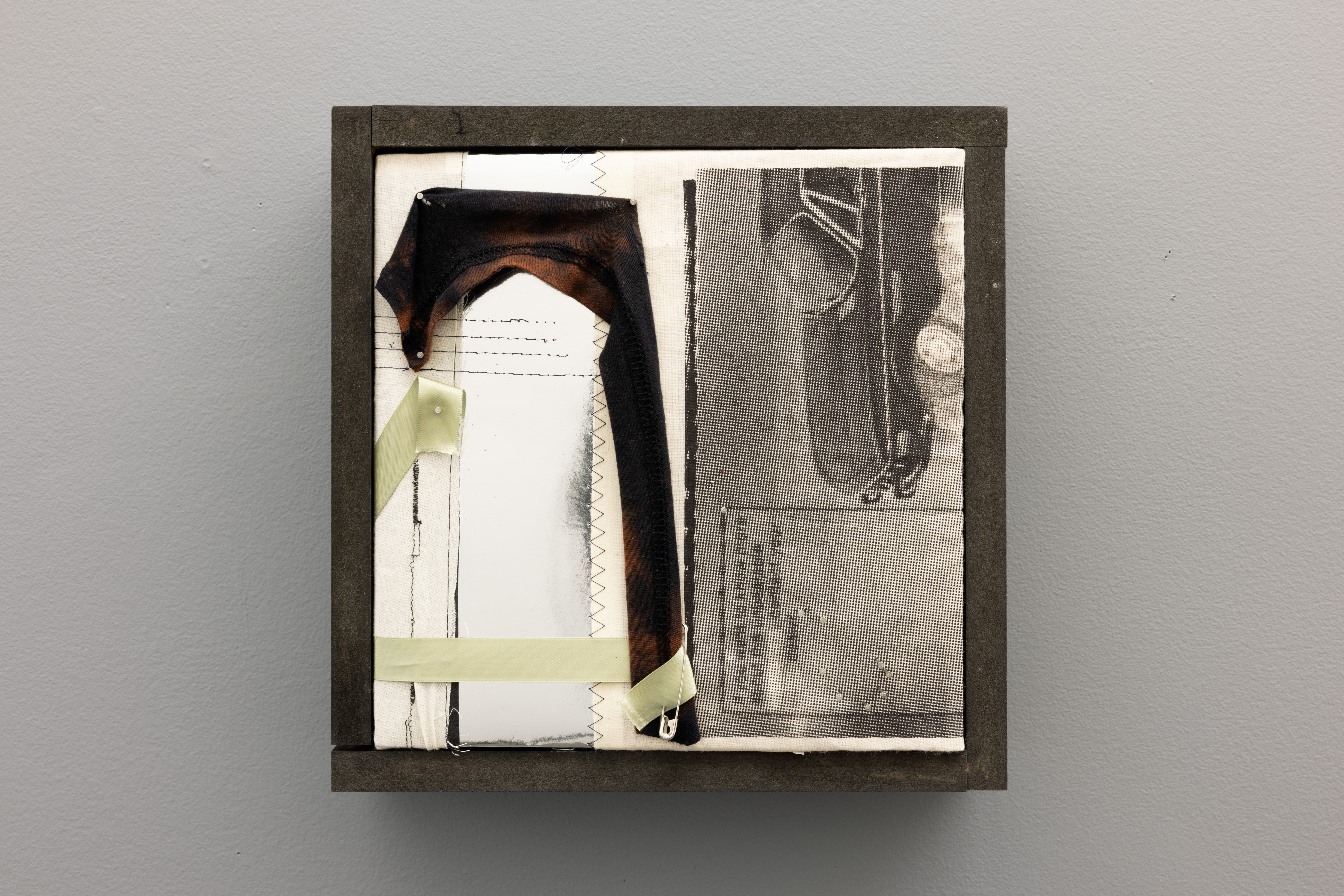 if you want to know about the unbeatable (2024.) metallic film, bleached t-shirt, ribbon, safety pin, screenprint on muslin, metallic film, wood. 12" x 12."