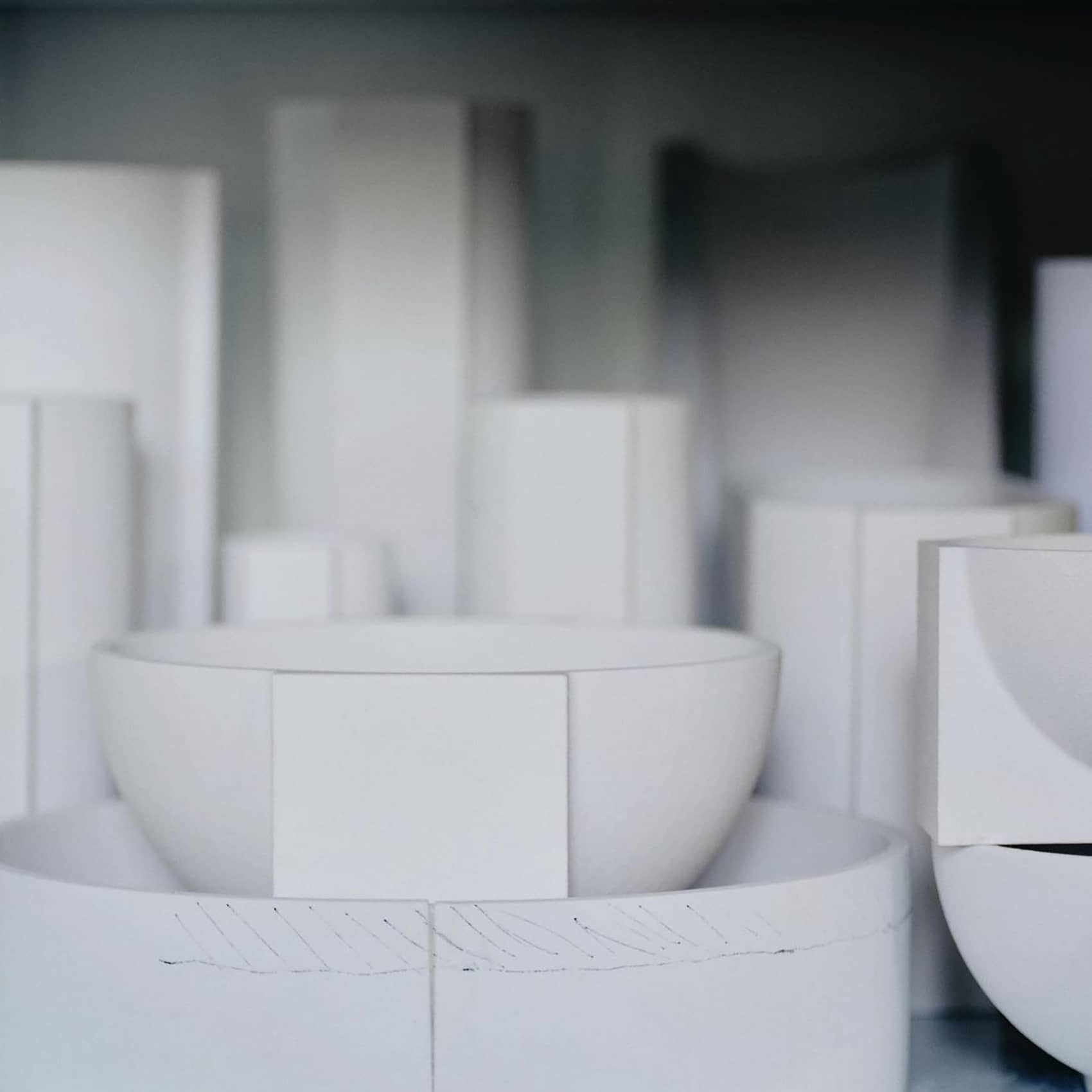 FORMA FOR HOLMEGAARDWith its weighty, sculptural constructions in solid glass, Forma is a product series rooted in the historical Bauhaus era, where shapes like cubes, spheres, and cylinders served as primary design elements. Forma embodies the same graphic strength through massive geometric shapes intersecting with one another. This bold design language engages with the negative space surrounding the structure, influencing how the brain interprets the fusion of forms.Designed in collaboration with Laura BildeGo to product page →