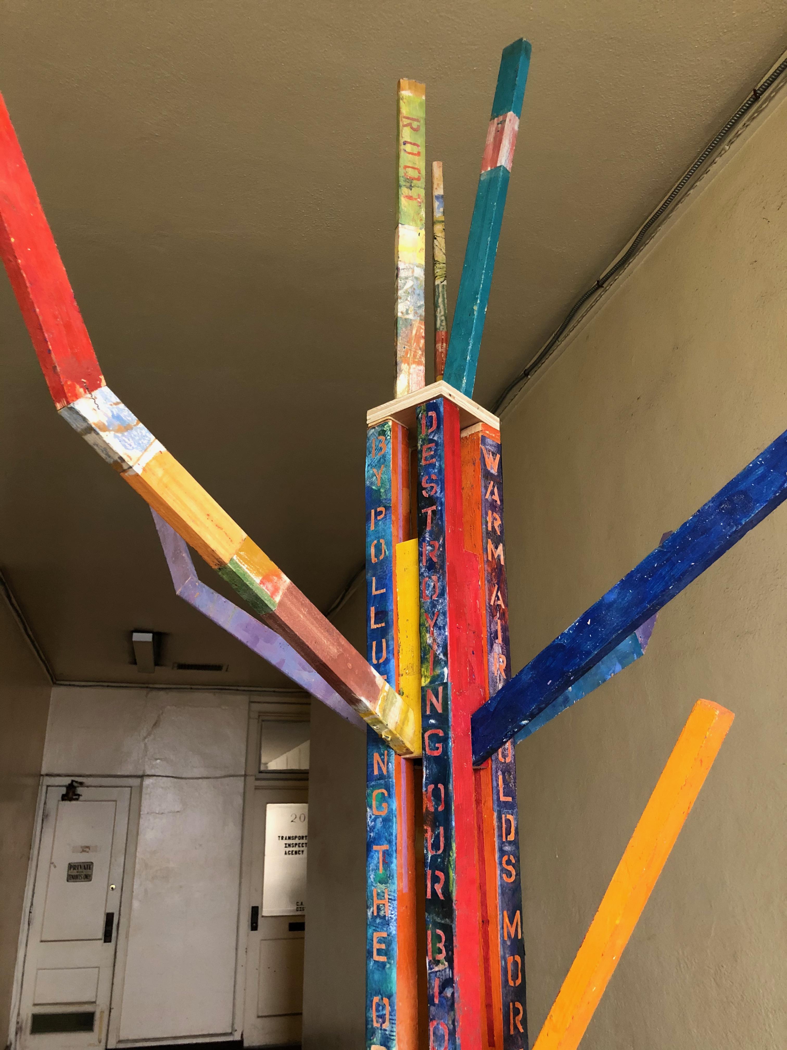 Tree-text #1 DETAIL. 2020. encaustic & collage on wood. 9' X 4' X 4'