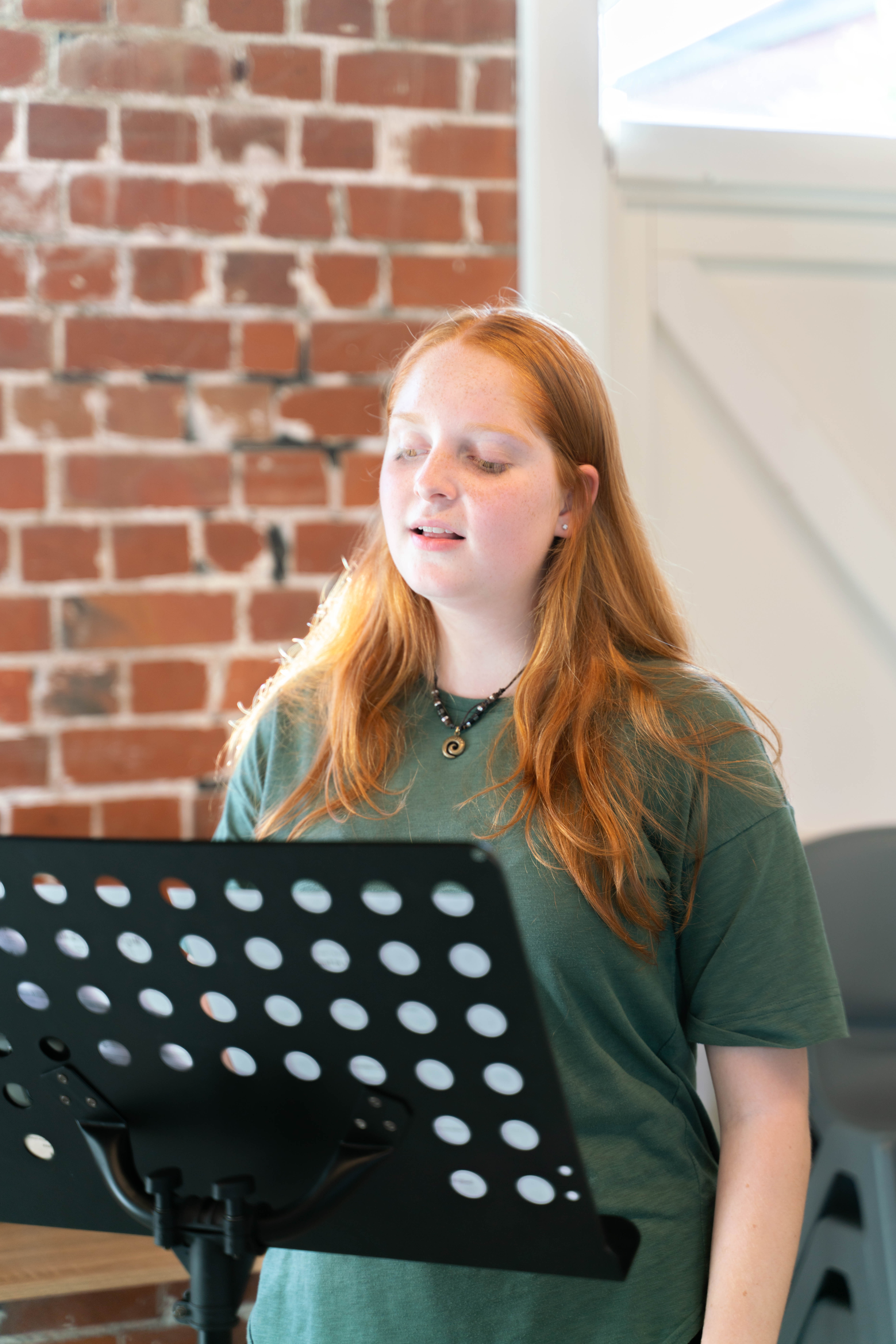 Vocal training at Sole Music Academy, photographed by Ella Waswo.