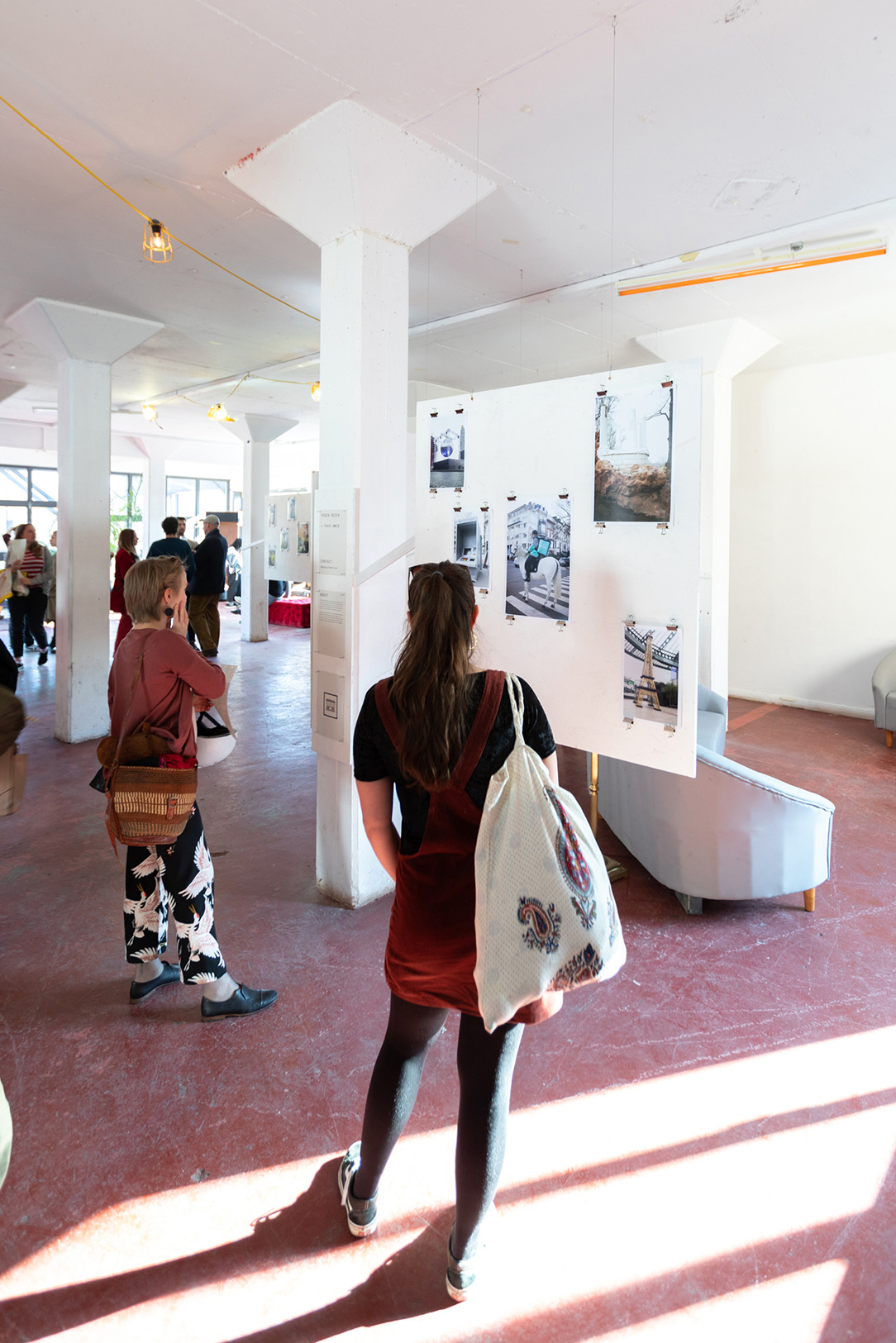 > The exhibition space with Robin Rozens' surreal photographs of paris on display