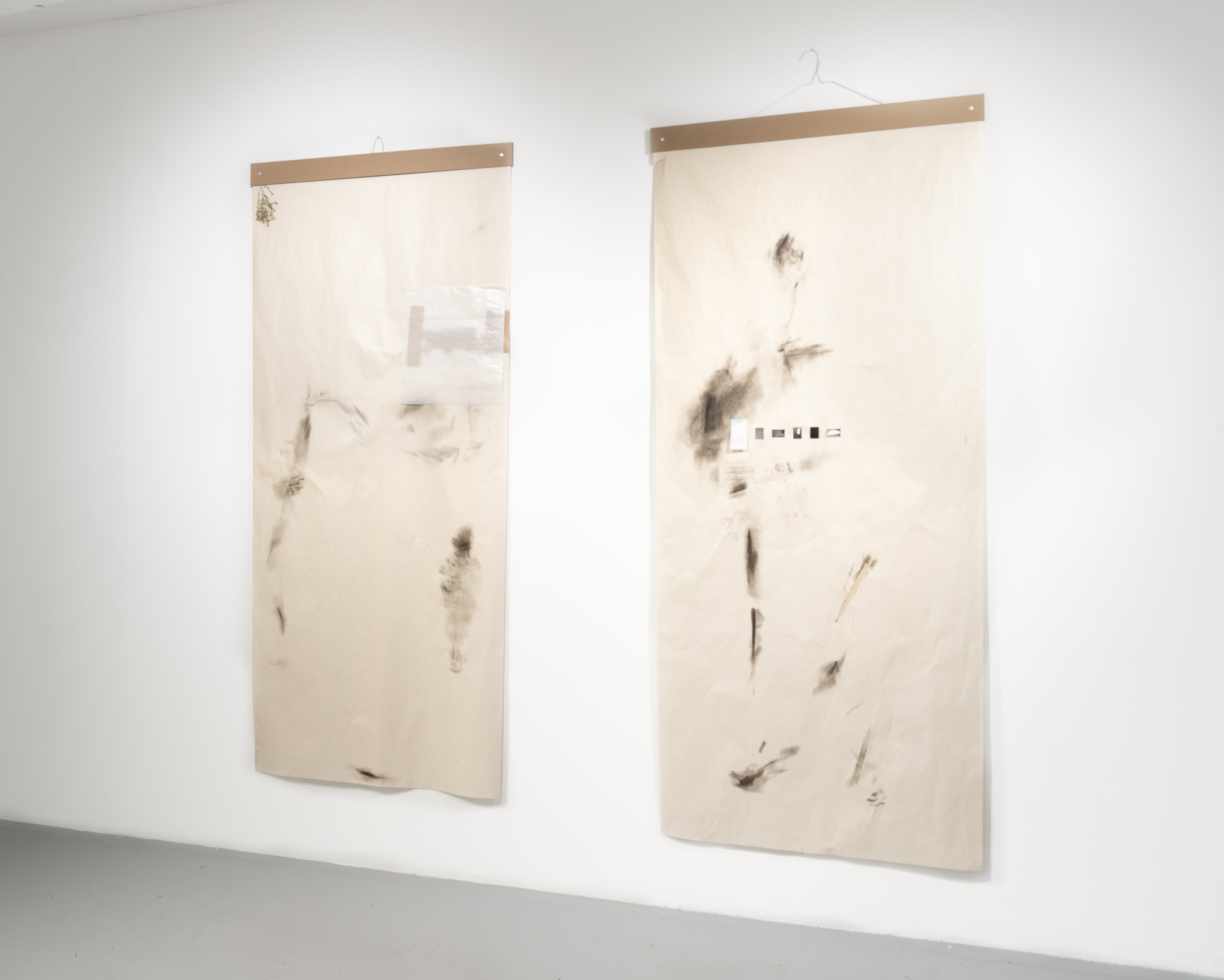 Untitled, 2022-2023. Soot and wax on newsprint, mended with numerous things, various dimensions.