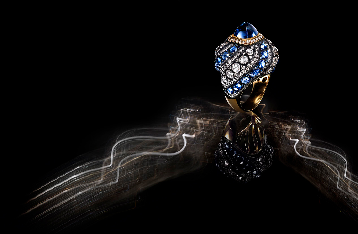 KMA photographer Isabelle Bonjean photographs blue ring against black background for Gilan