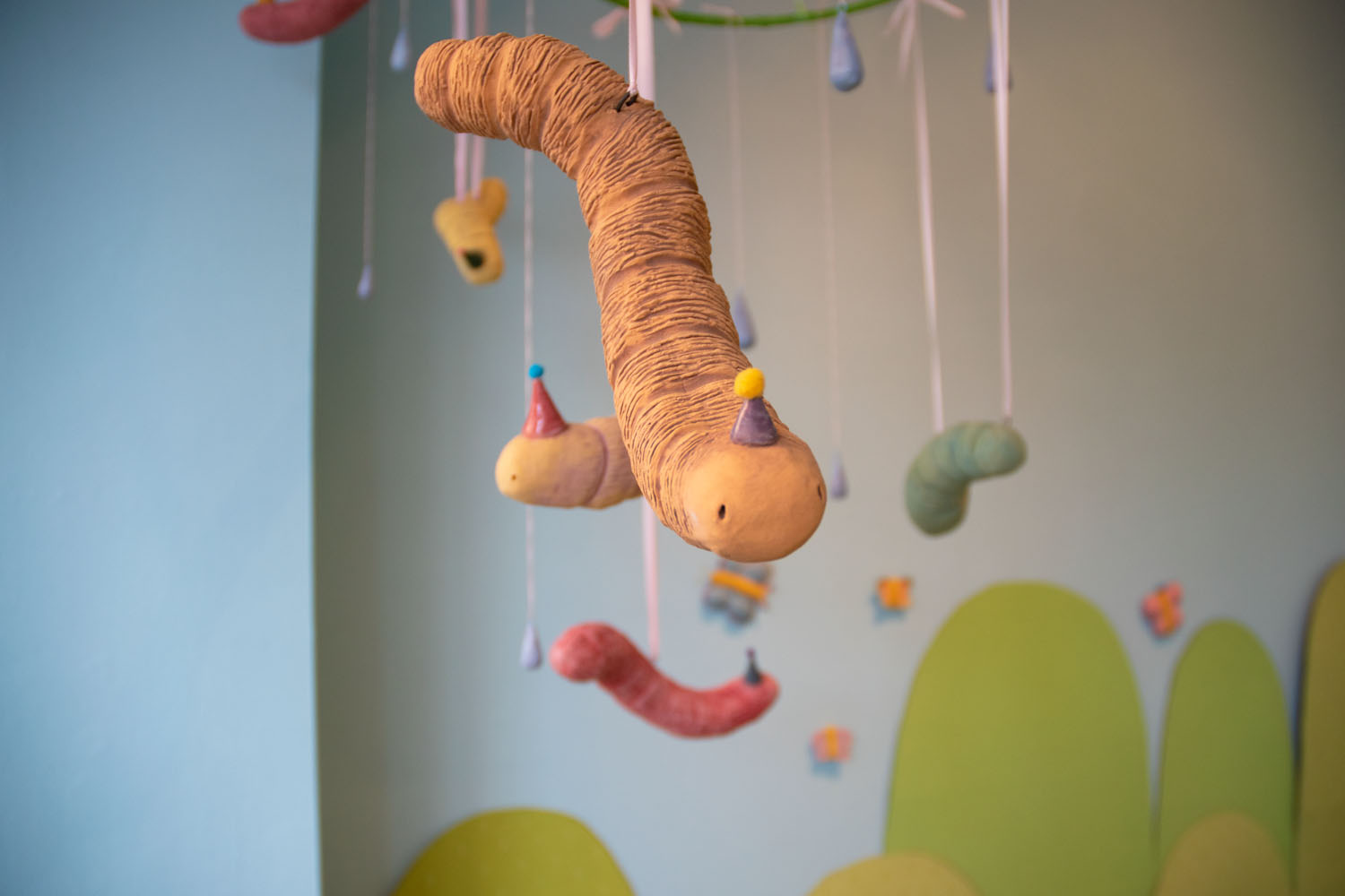 GRUB PATROL! (detail)  Low-fire clay, underglaze, mixed materials, Variable and adjustable size, 2022