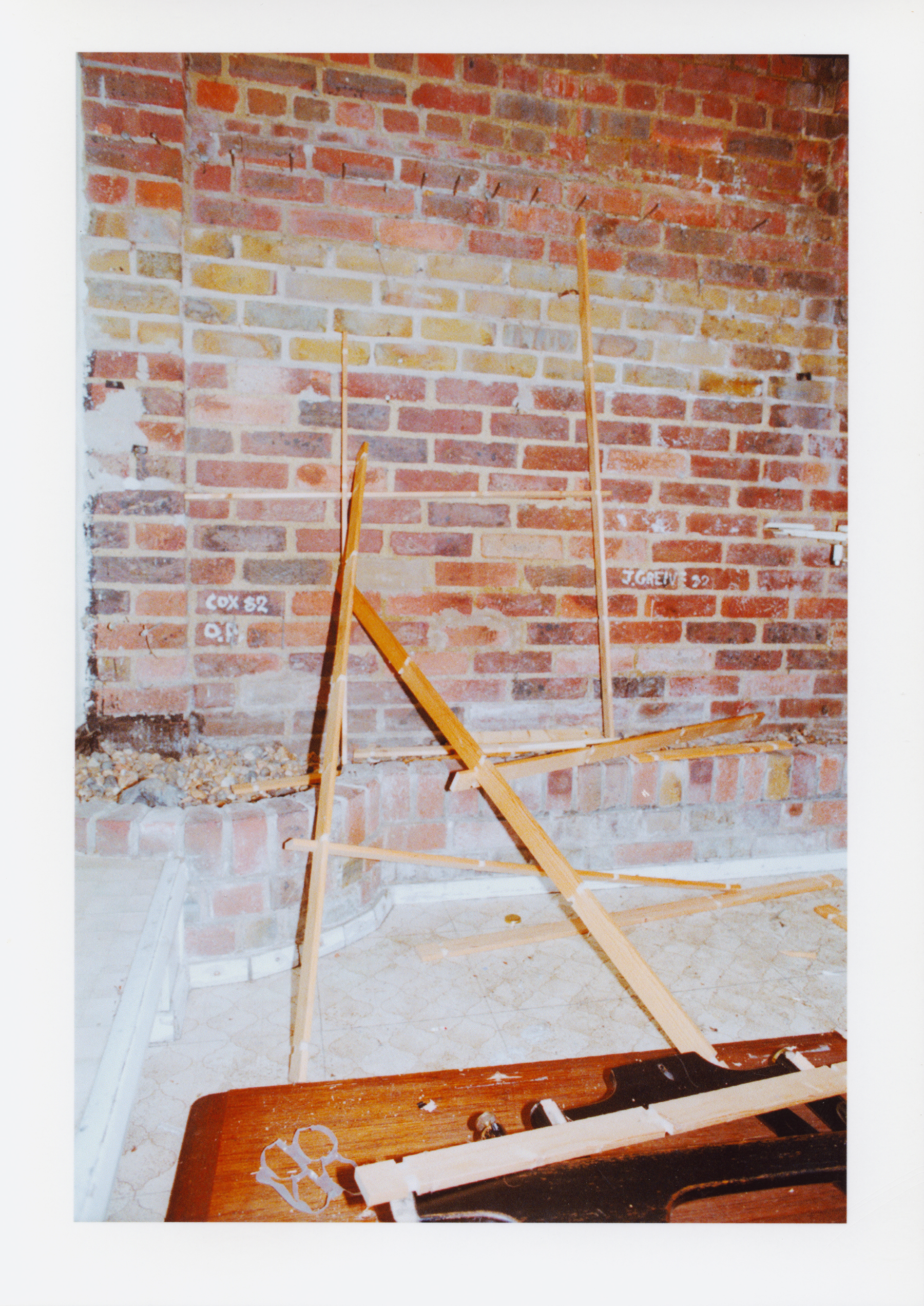 Closed-world picture X (approx 36 x 72 x 42”) flat pack shelving system in red brick conservatory. 2019