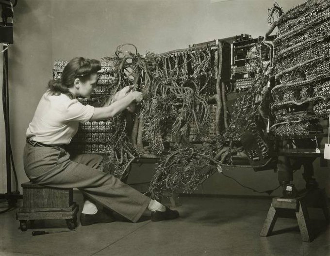 'Woman wiring an early IBM computer' from the 'Documenting Science' series (1938-58) by photographer Berenice Abbott
