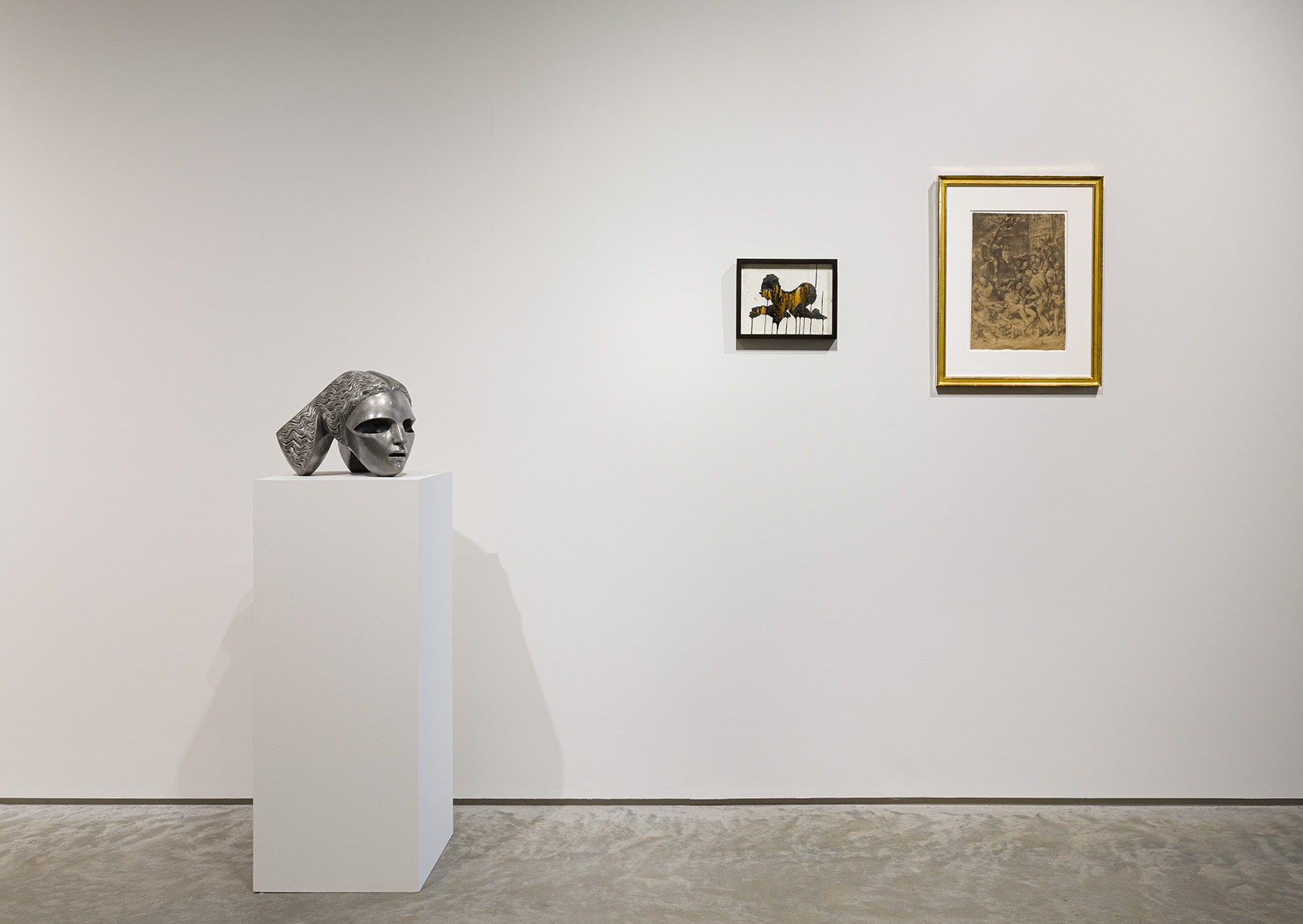 (From left to right) Sarah Peters, Charioteer 2, 2022. Bronze with silver nitrate patina, 11 x 14 x 15 inches; Kara Walker, Untitled Sketch for Domino Materials, 2013. Molasses and graphite on paper, 8.5 x 11 inches; Zorawar Sidhu, Martyrdom of St. Lawrence, 2019. Sanguine, Haematite, Earth Pigments, and gum bichromate on hand made cotton-linen paper with frame, 23 3/4 x 17 3/4 inches. Photo by Etienne Frossard. 