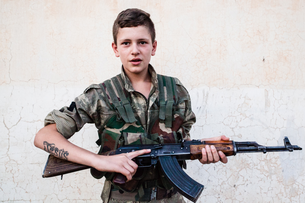 Tirbespiye, june 2014. Fighter of the Syriac Military Council, an armed force created to defend the syriac community, and working in tight collaboration with the kurdish ypg.