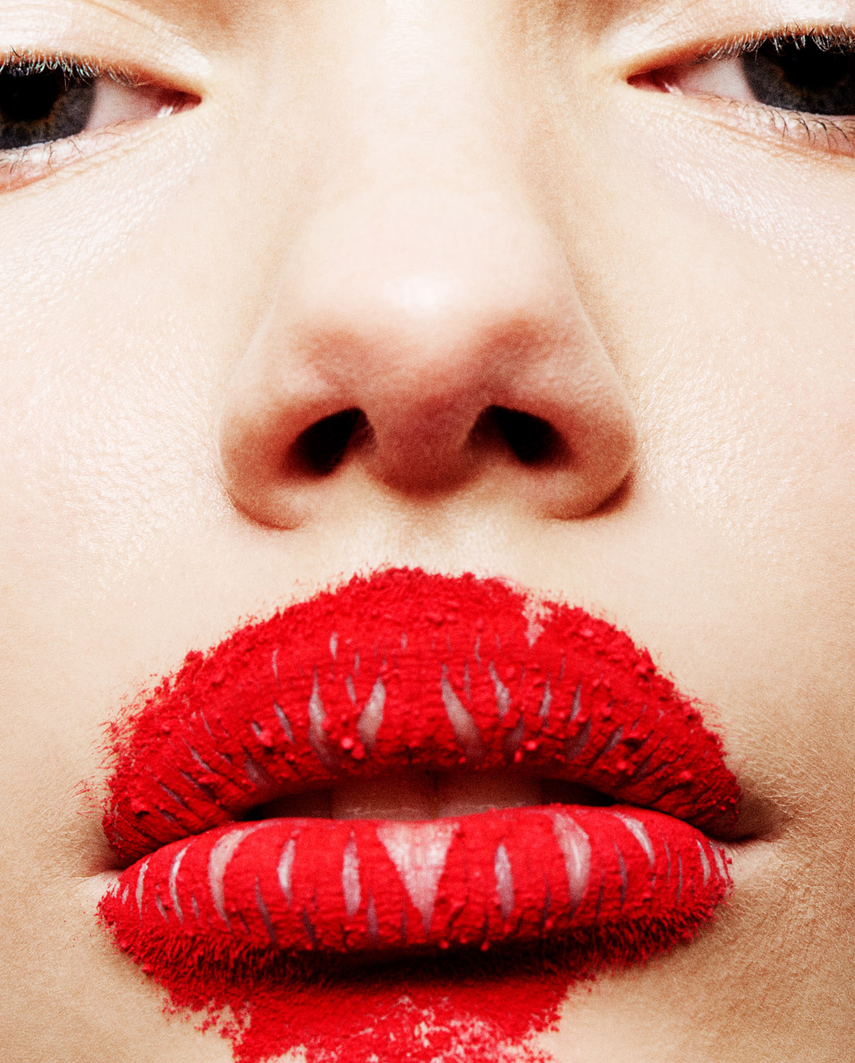 Still Life Photographer Martin Vallin captures vibrant red lips in a close up image for Vilhelm Parfumerie
