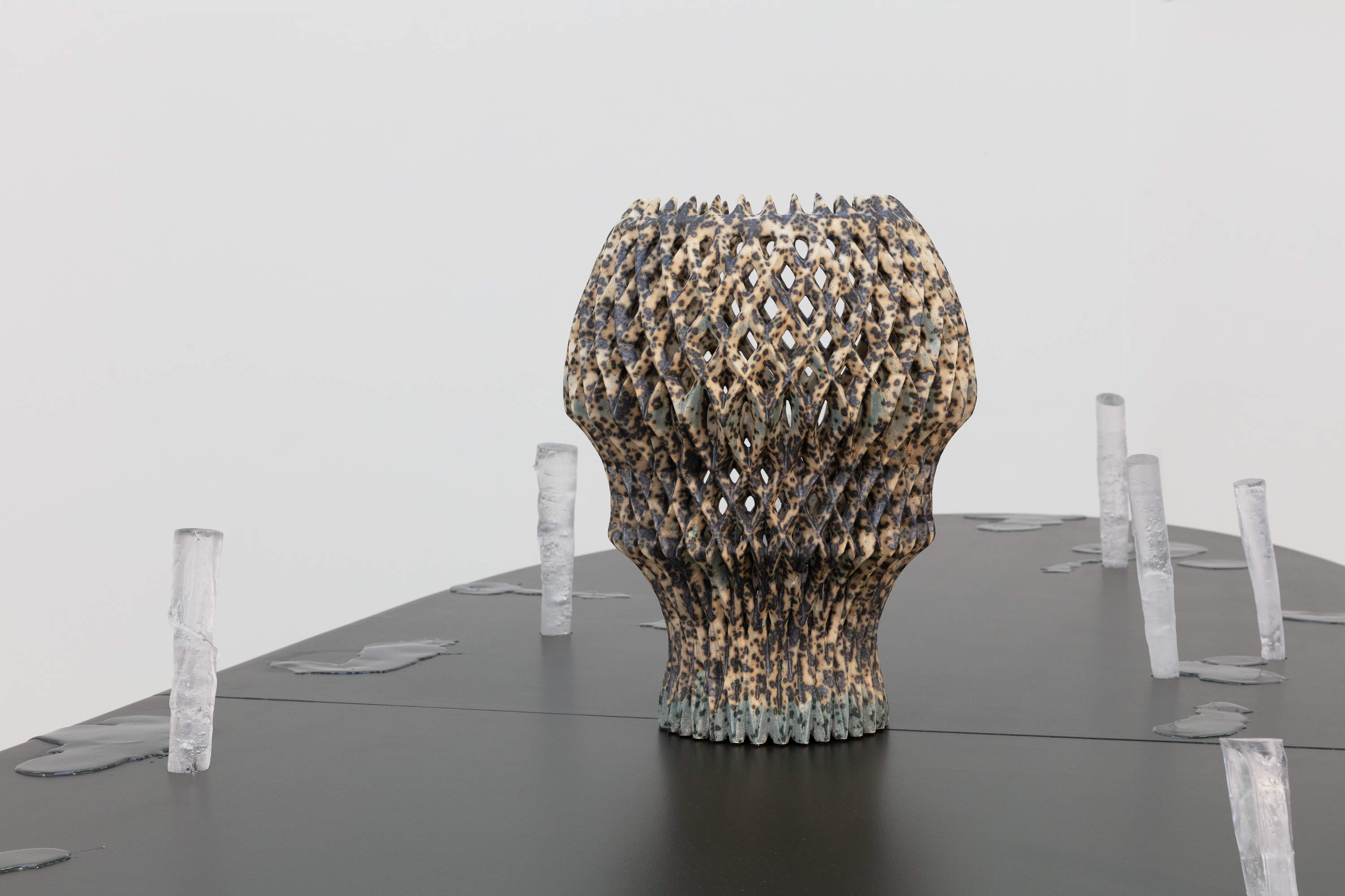 Suckers at the base of the main stalk, glazed stoneware, casted glass, glass wax, aluminium, ground screws in galvanized steel, MDF, paint 150x122x360cm