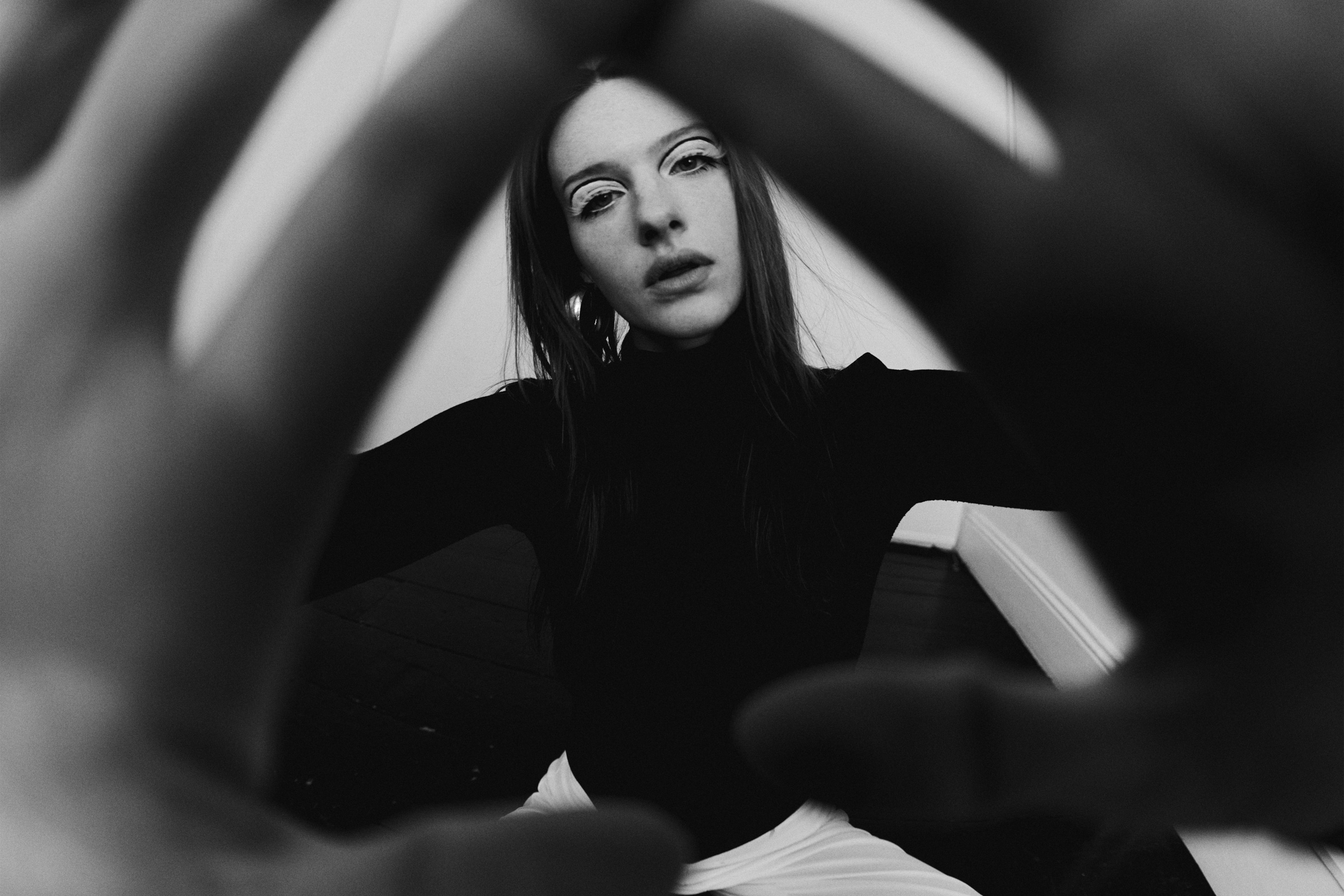 Fisheye photo of a model in studio photographed by Dublin based lifestyle, fashion, and advertising photographer Alex Sheridan for