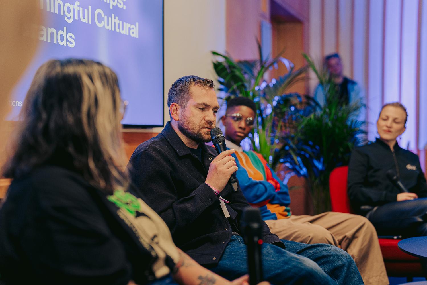 Speaker sharing insights during AVA London 2025’s ‘Art of Brand Partnerships’ panel alongside other panellists.