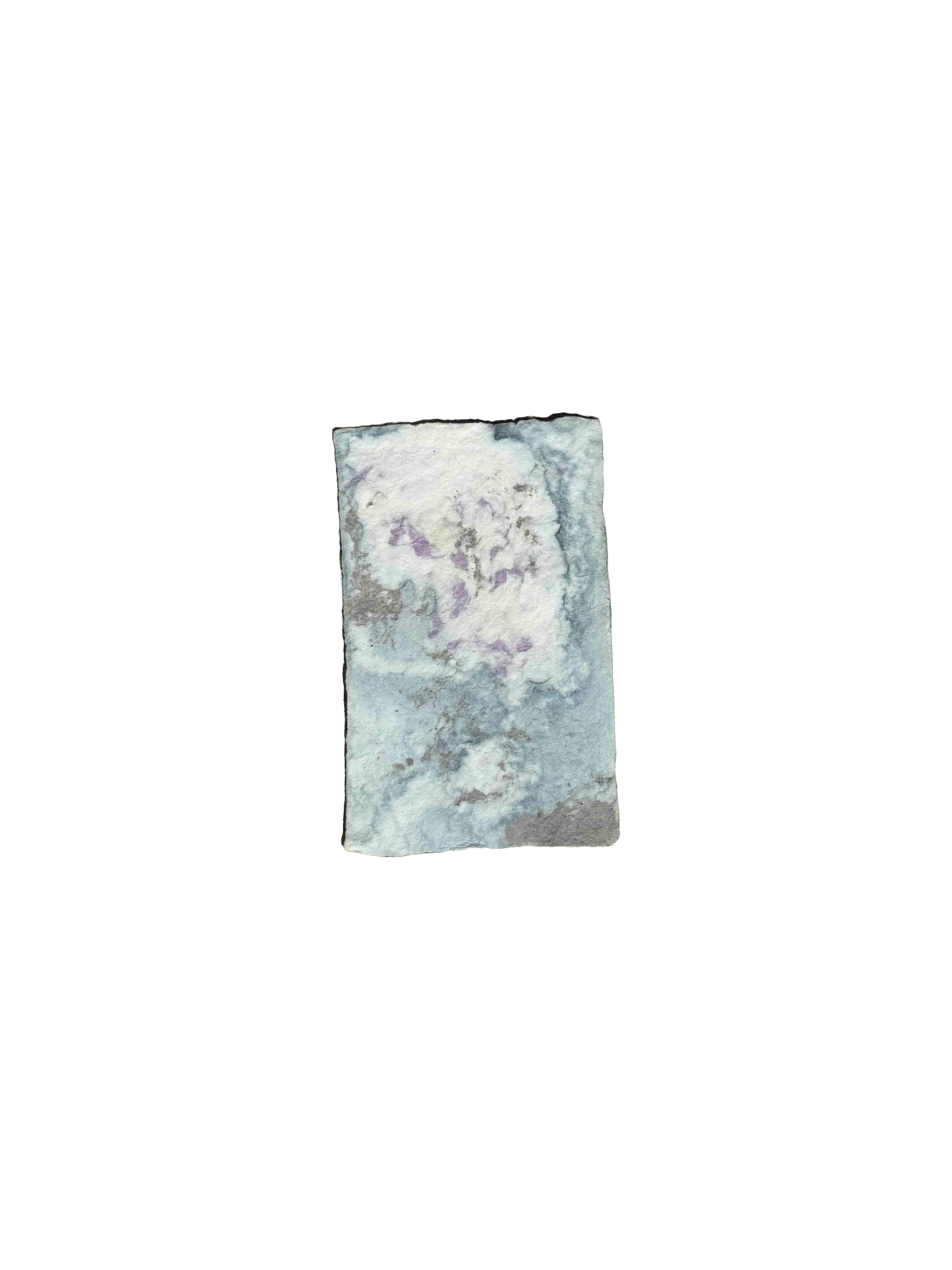 homemade paper with cotton pieces in assorted natural dye
