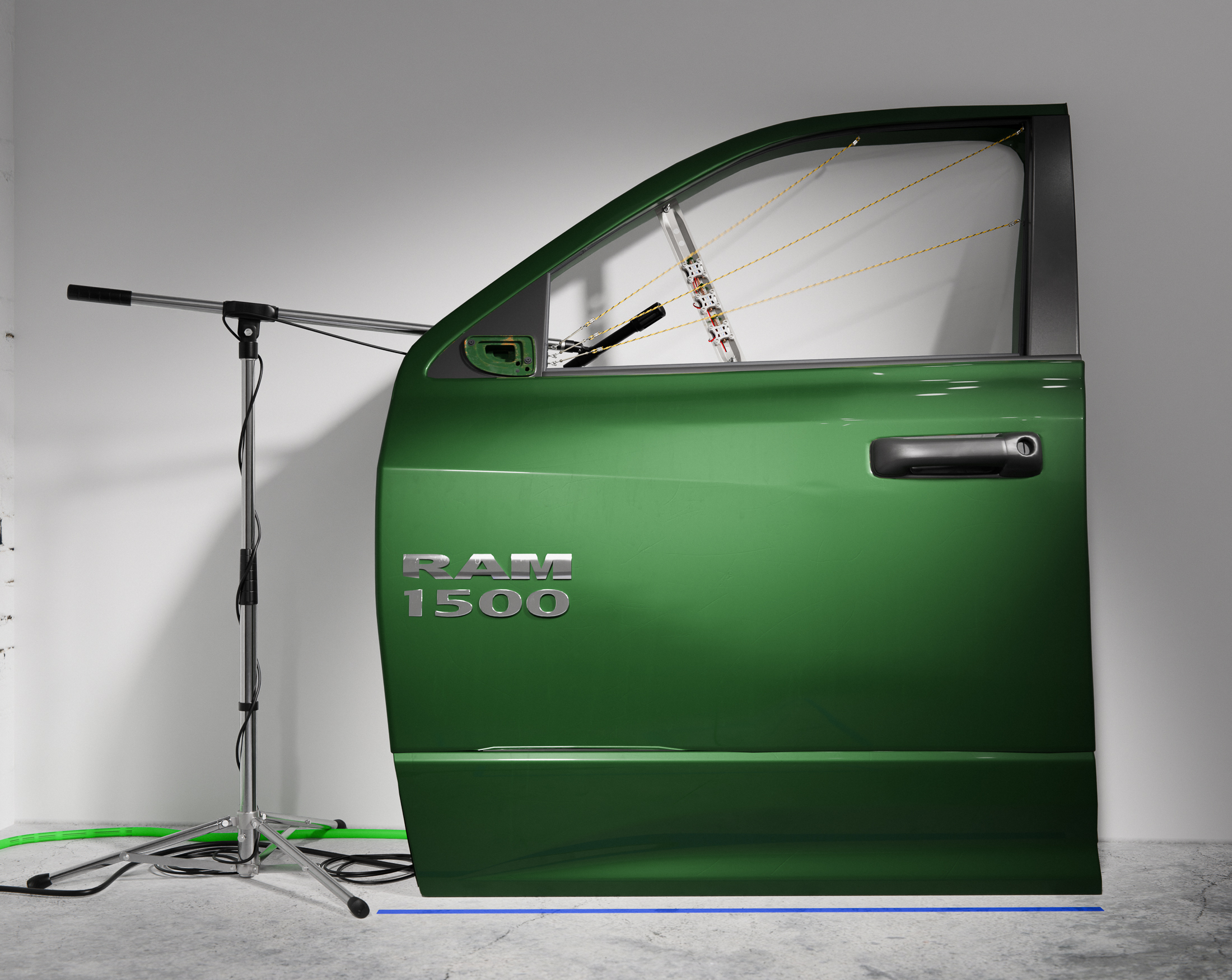 Zero sum just remainder, 2022, megaphone, muzzle, truck door, electric fence wire, solenoid servo motors, plectrums, hardware, guitar amplifier, cabinet, arduino controllers, zip ties, mics, mic stands, cables, tape, dimensions variable