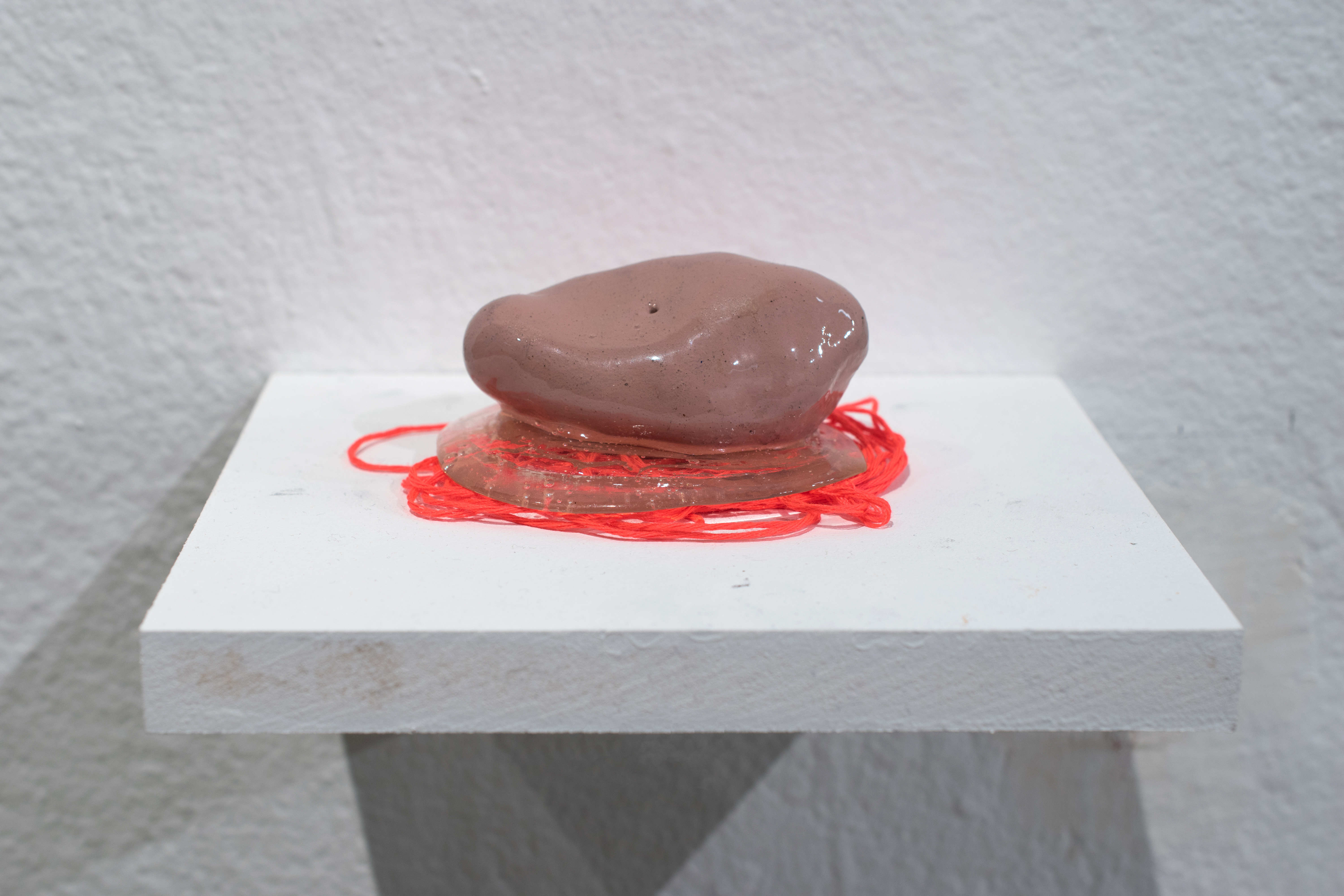 proof that I matter (navel); urgency to feel; fired clay, string, acrylic medium and paint; 2018  